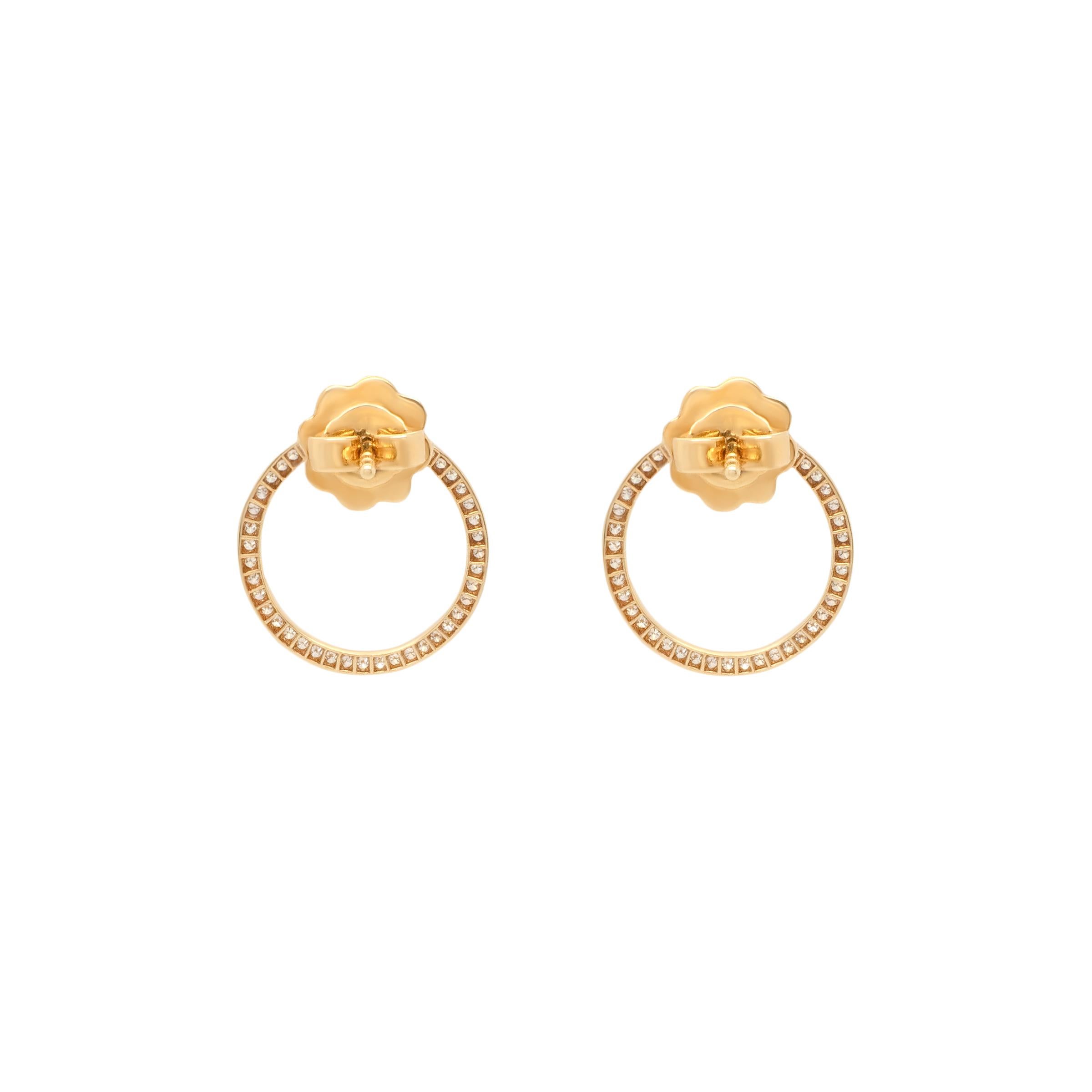 These fun and playful circle earrings are made from sparkling pav'ed diamonds. The VVS diamonds are set into the the circle design and are perfect for daily wear or dressed up for the evening. 