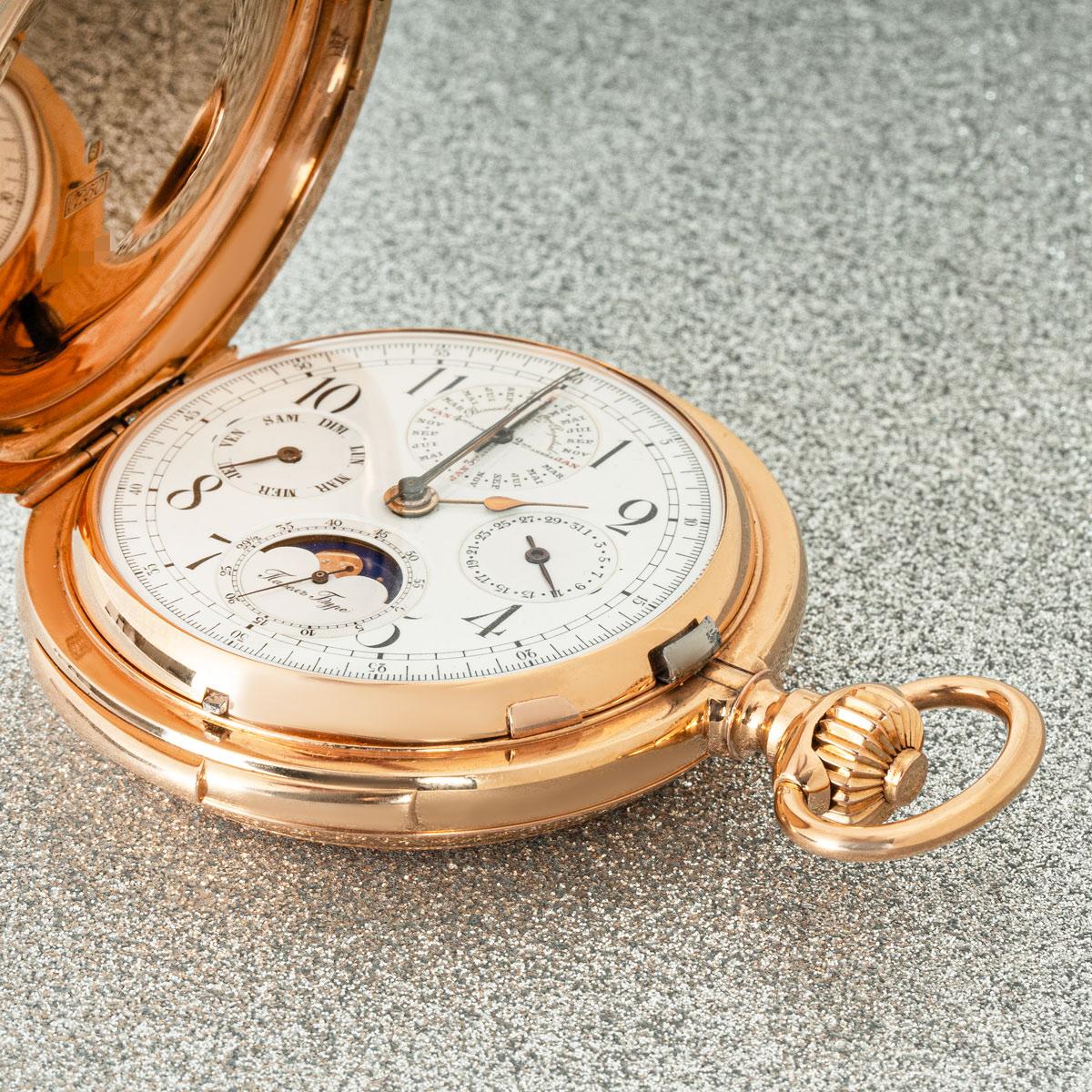 Pavel Buhre. A Massive Gold Keyless Lever Perpetual Calendar Minute Repeater Chrongraph Full Hunter Pocket Watch C1890

Dial: The excellent white enamel dial with Arabic numerals and outer tachometric minute track. The four subsidiary dials with the
