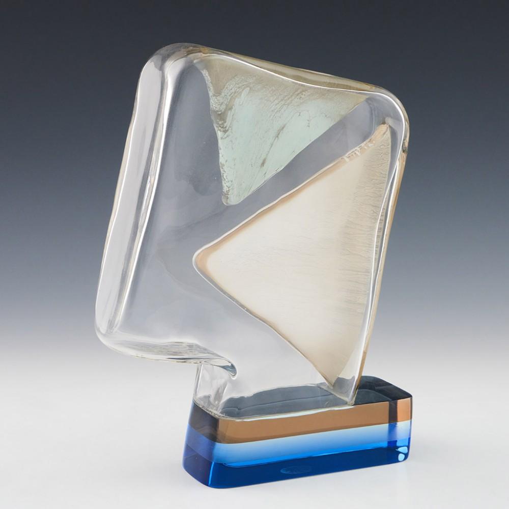 Pavel Hlava Head Sculpture, 1994

Pavel Hlava is renowned for using the medium of glass for sculpture. Many of these are made up of cut and polished geometric segments of coloured glass, or are blown and manipulated with hot metal tools such as