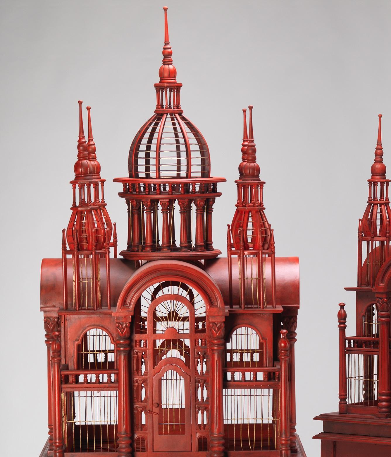 An exceptional pair of architectural bird cages with red patinated paintwork. They are extremely decorative and ready for immediate placement.

We are currently working to a 30-36 week lead time.
