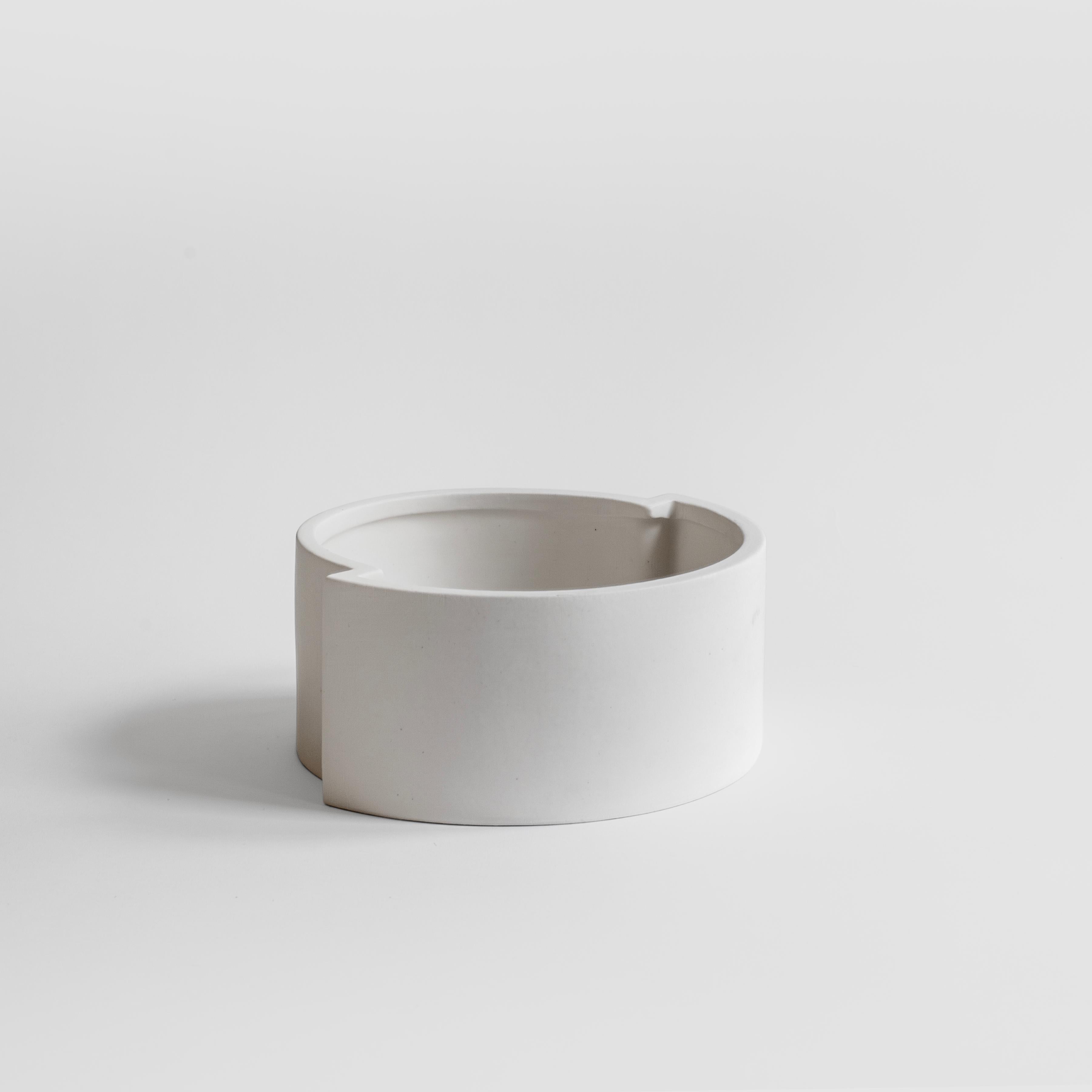 A minimalist and playful fruit bowl in slip-cast ceramic with a white matt crystalline glaze, the piece is handmade in Milan.
Part of the 
