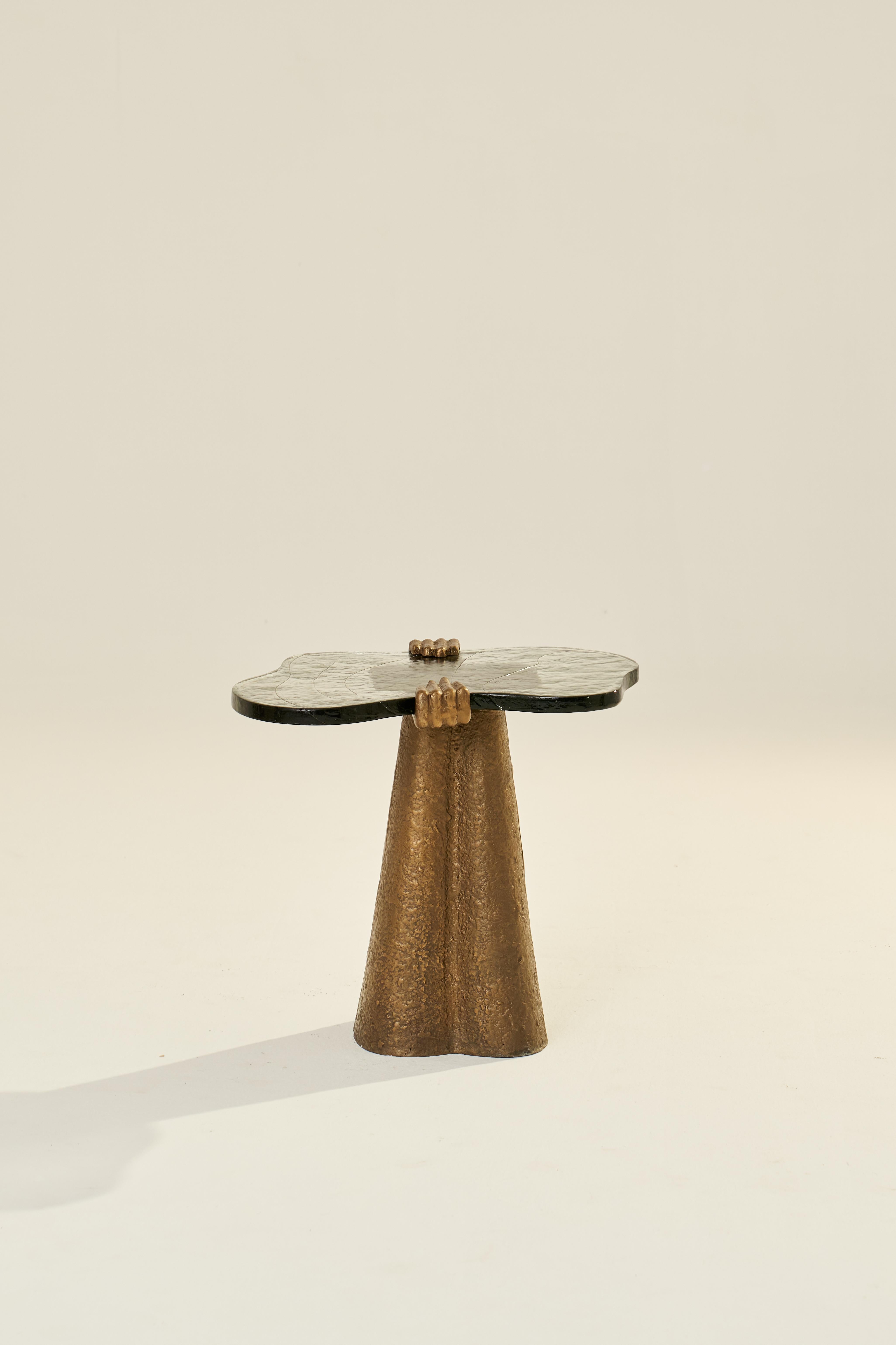 Born from a desire to forge something captivatingly unique, this limited-edition piece stands as a testament to innovative design. Its aluminium body is a celebration of the material's inherent rawness, malleability and resilience. The table's crown