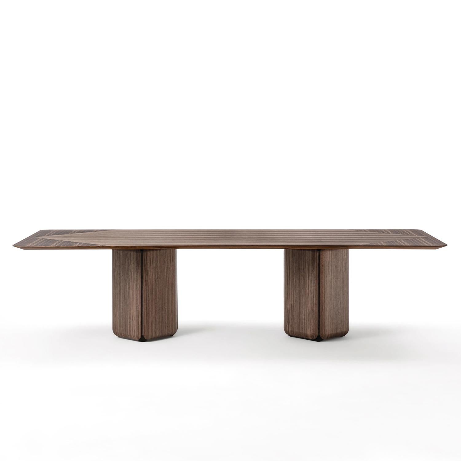 Rectangular Table Walnut Pax with two solid walnut
base. 
With a solid walnut top
Also available on request with solid walnut base in stained in
moka finish or in wenge finish.
Also available on request with plate in glass or marble