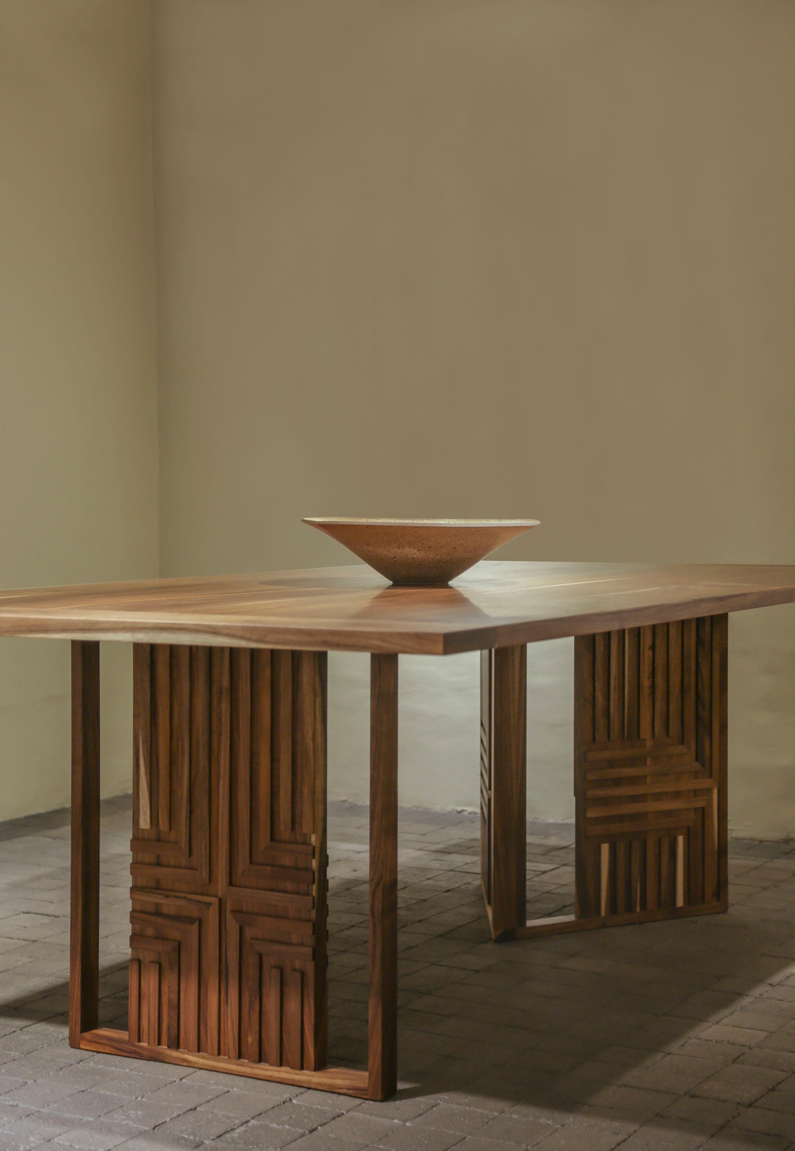 Introducing an extraordinary piece of functional art – the artisanal-crafted Paz table from the limited Rutsu Collection. Immerse yourself in the breathtaking detail of the woodwork, meticulously designed to create a true centerpiece for your