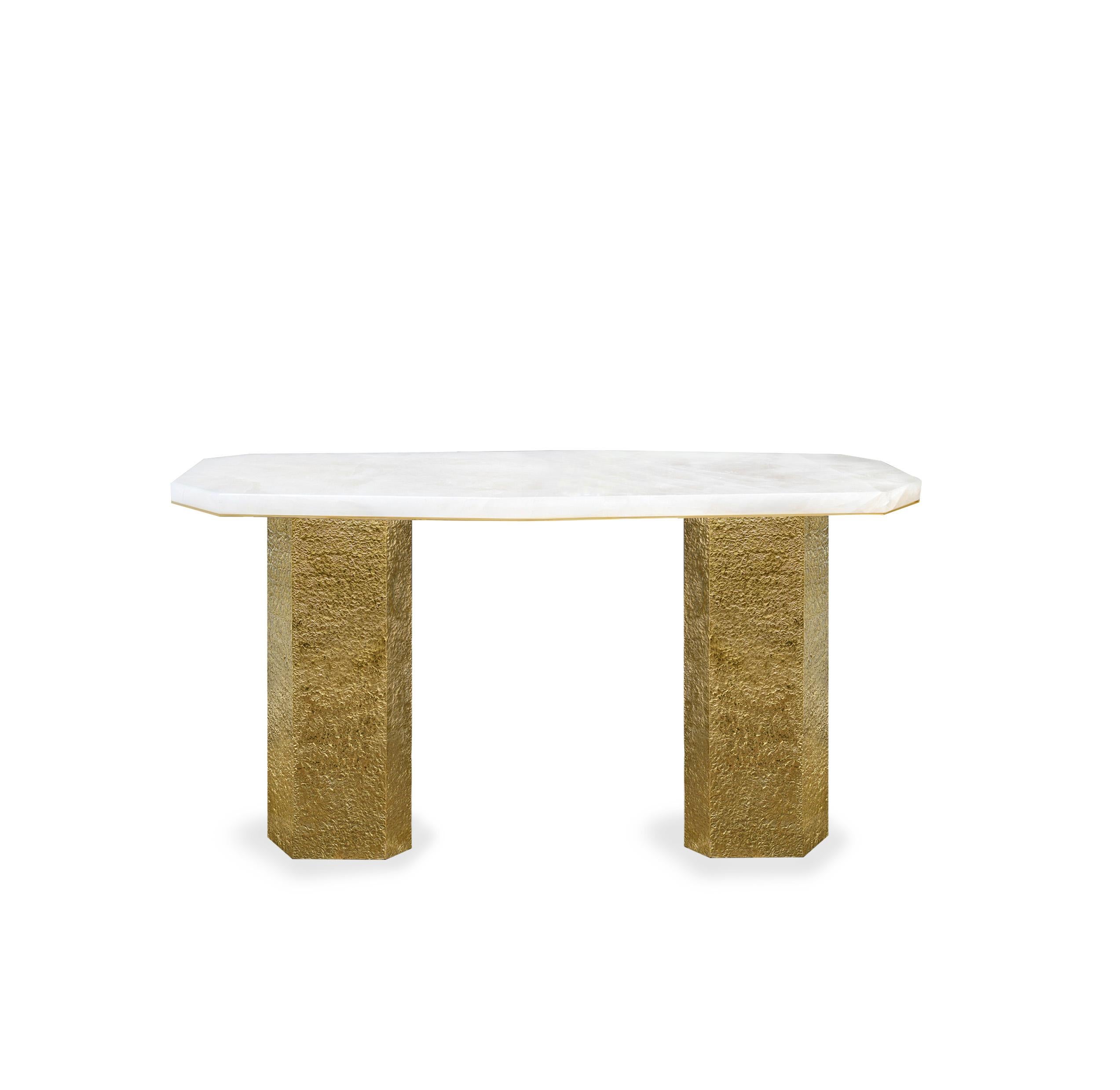 Elegant form rock crystal console table with hammered brass base. Created by Phoenix, NYC.
Custom size upon request.