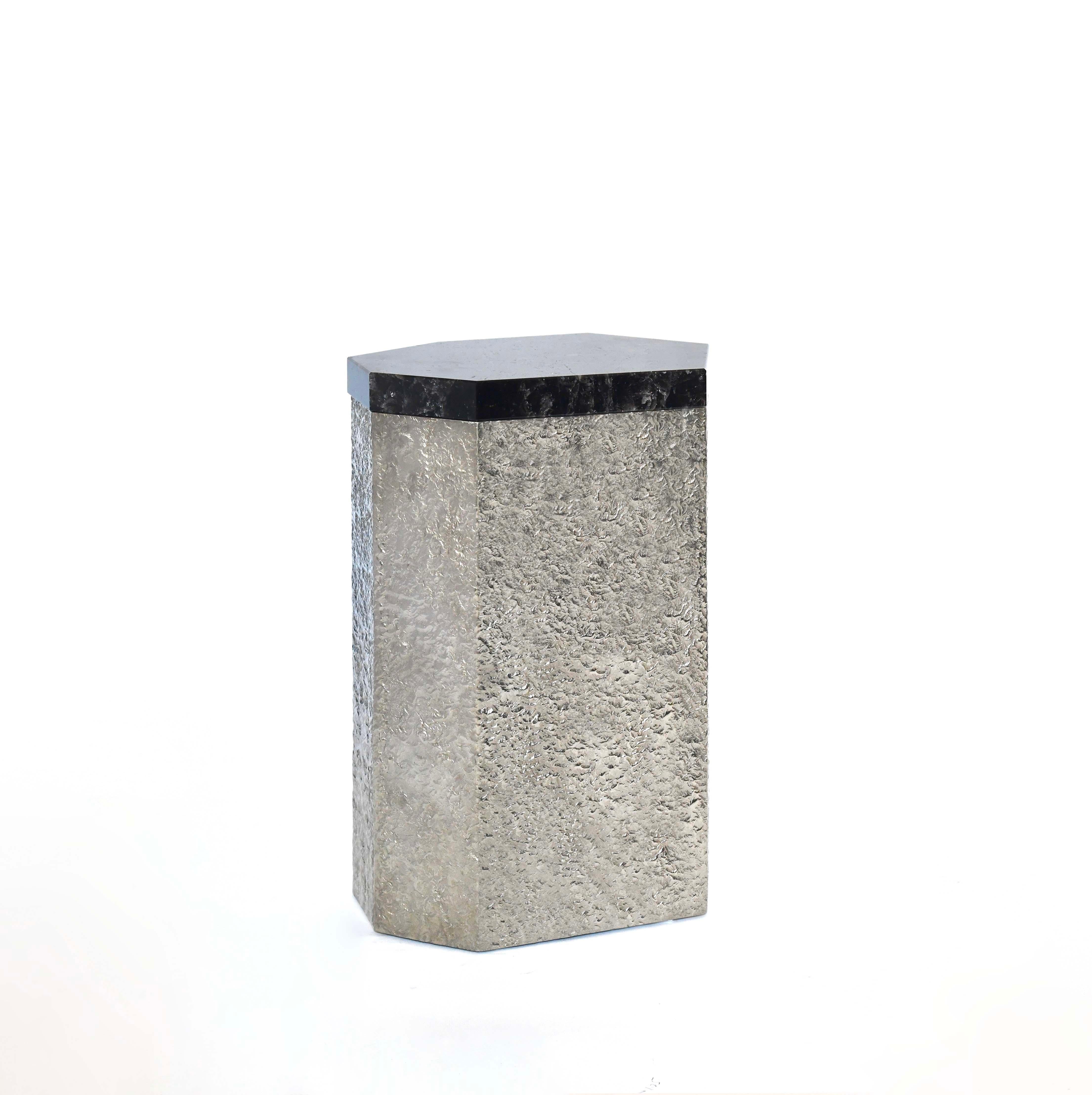 Elegant form rock crystal side table created by Phoenix Gallery, NYC. Hammered nickel base with dark smoky rock crystal quartz top.
Custom size, quantity, and finish upon request.
