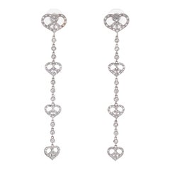 Vintage Peace and Love Diamond Earrings Estate 18 Karat White Gold Heart Sweeper Long