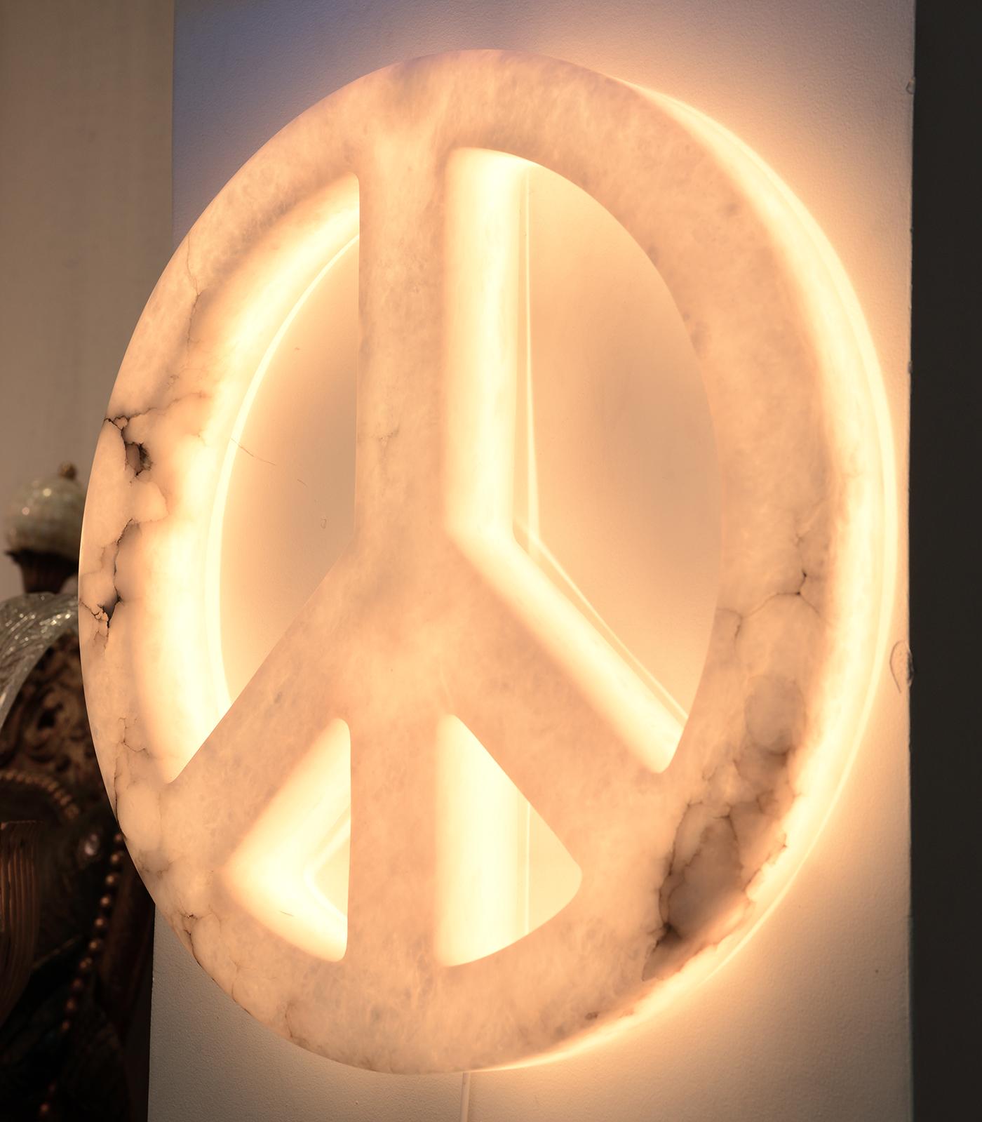 Wall lamp Peace & Love Alabaster with
all structure in alabaster with lighting sytem
including, with electric cord on plug.