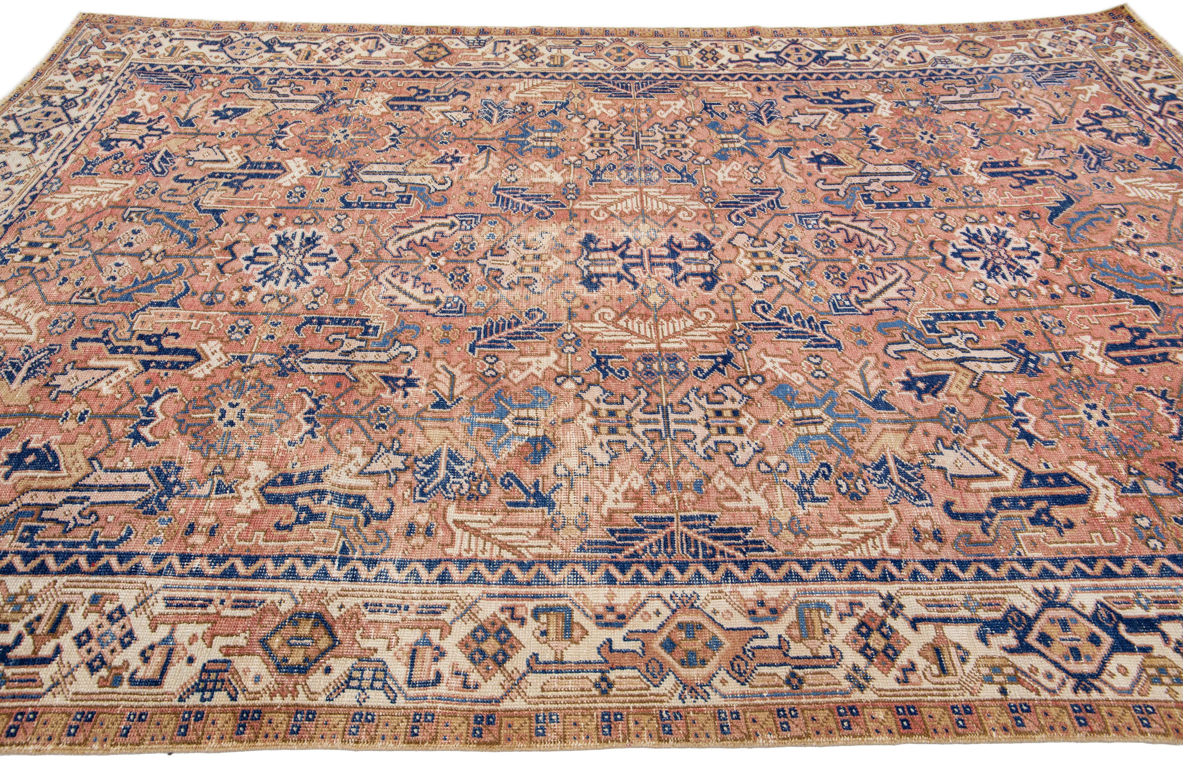 Early 20th Century Peach Antique Persian Heriz Handmade Allover Pattern Wool Rug For Sale