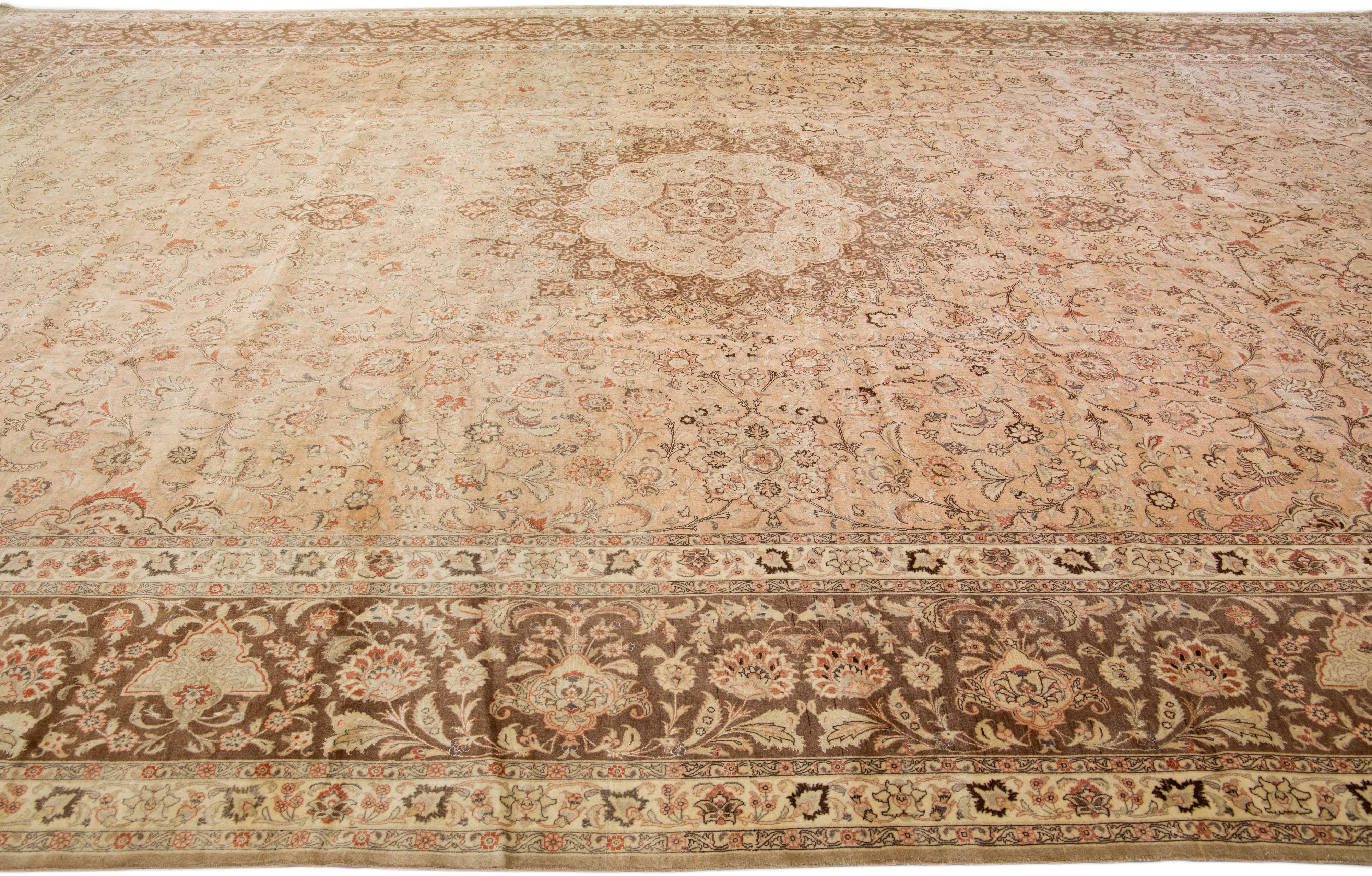 Peach Antique Tabriz Handmade Oversize Persian Wool Rug with Rosette Design In Excellent Condition For Sale In Norwalk, CT