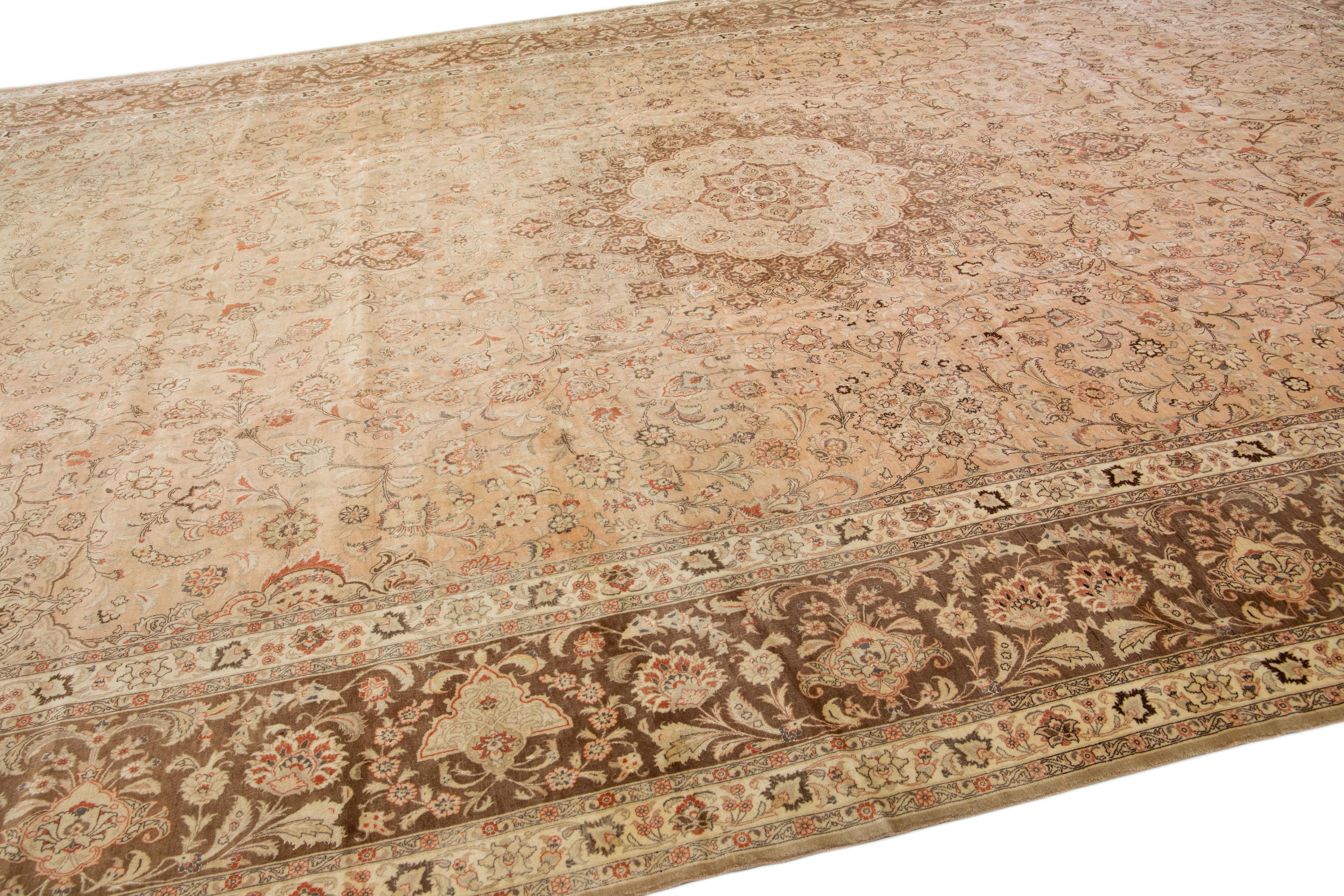 20th Century Peach Antique Tabriz Handmade Oversize Persian Wool Rug with Rosette Design For Sale