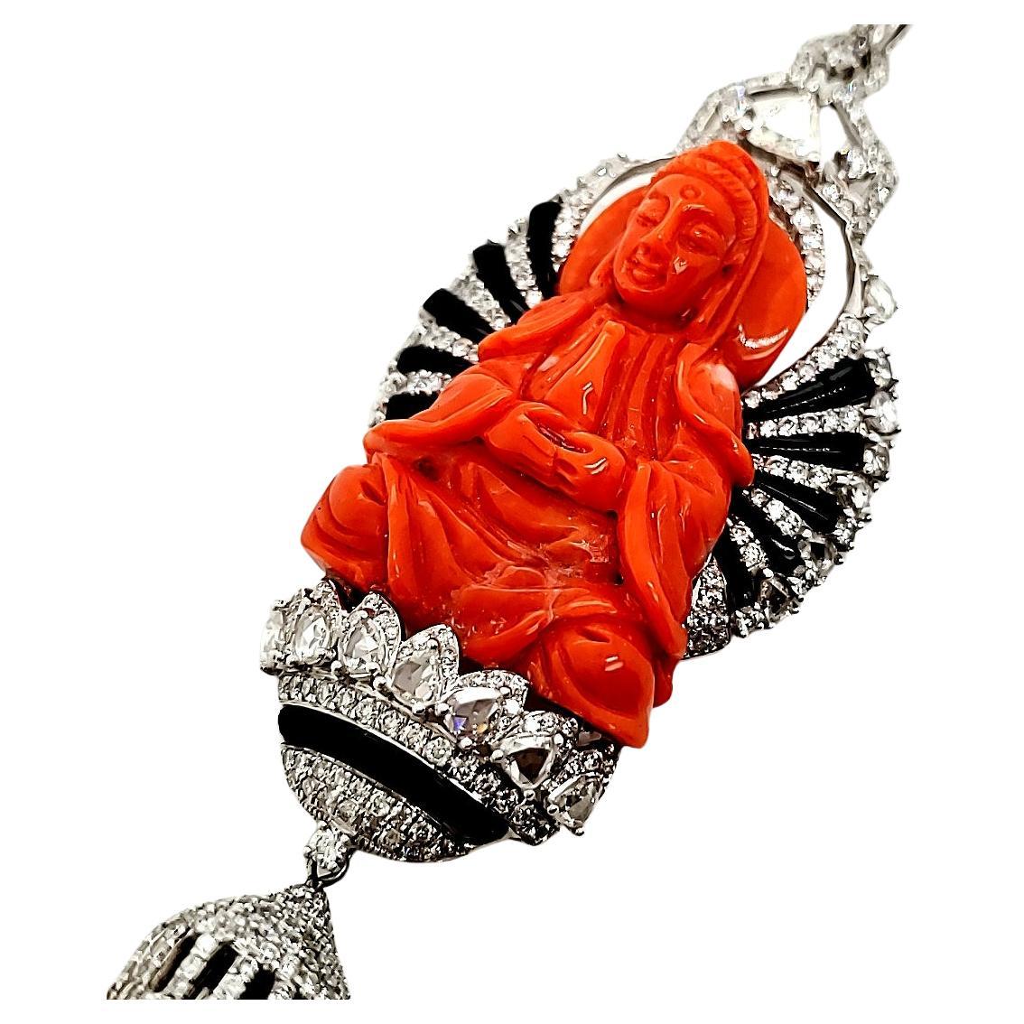 At the heart of this captivating necklace resides a serene Buddha statue, meticulously carved from peach coral, a gemstone revered for its calming properties and association with enlightenment. 

This exquisite coral Buddha weighs 40.93 cts. 

The