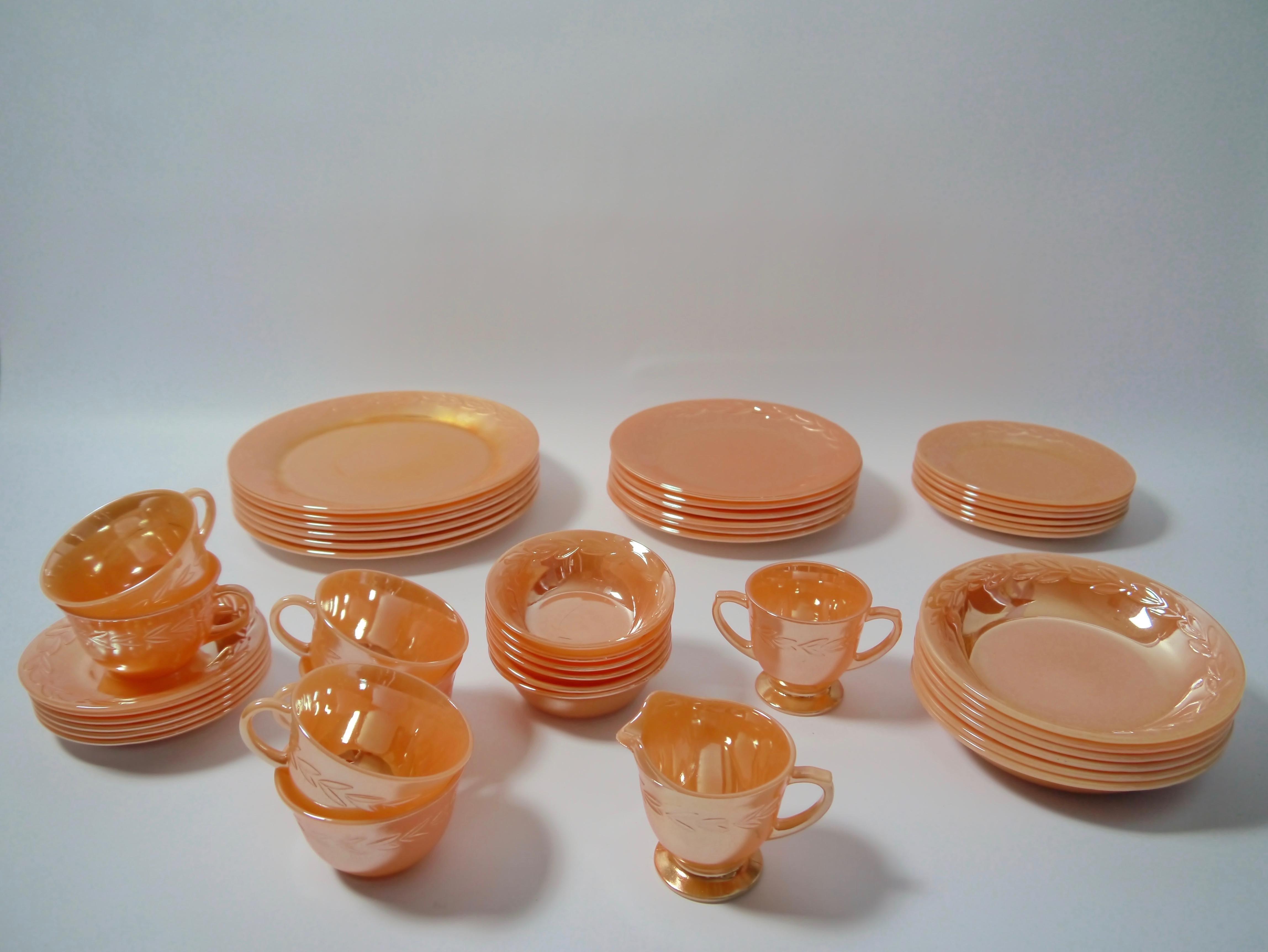 Complete 6 pax tableware set produced by Fire King in the 1950s. Peach lustre aka 