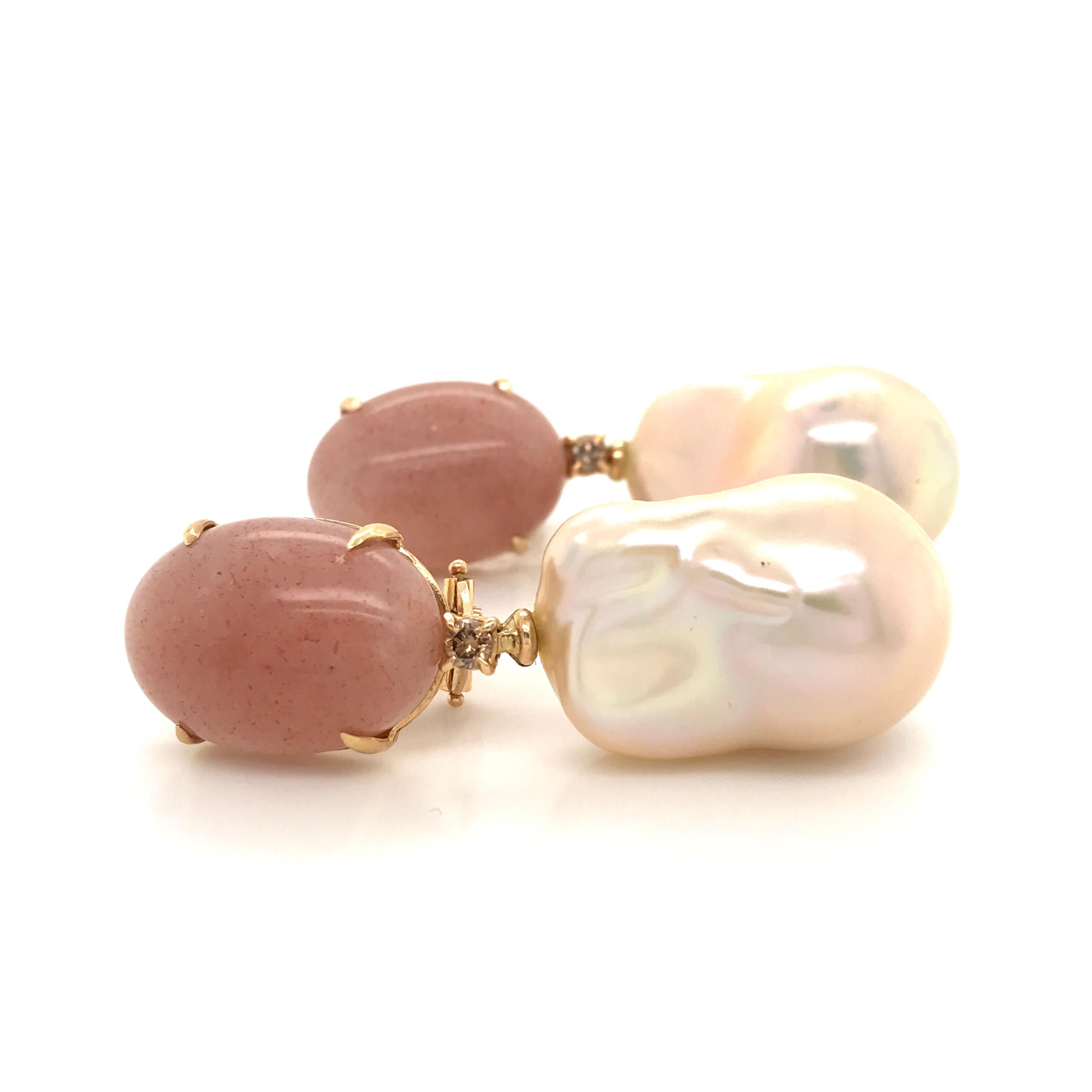 Peach Moonstone 
Baroque Pearls and Diamonds Yellow Gold Earrings.  
2 Brown Diamonds Color B/ 0.140 ct 
Yellow Gold 18 k weight of gold 4.30 grams 
Chandelier Earrings
Can be adapted to ear not pierced