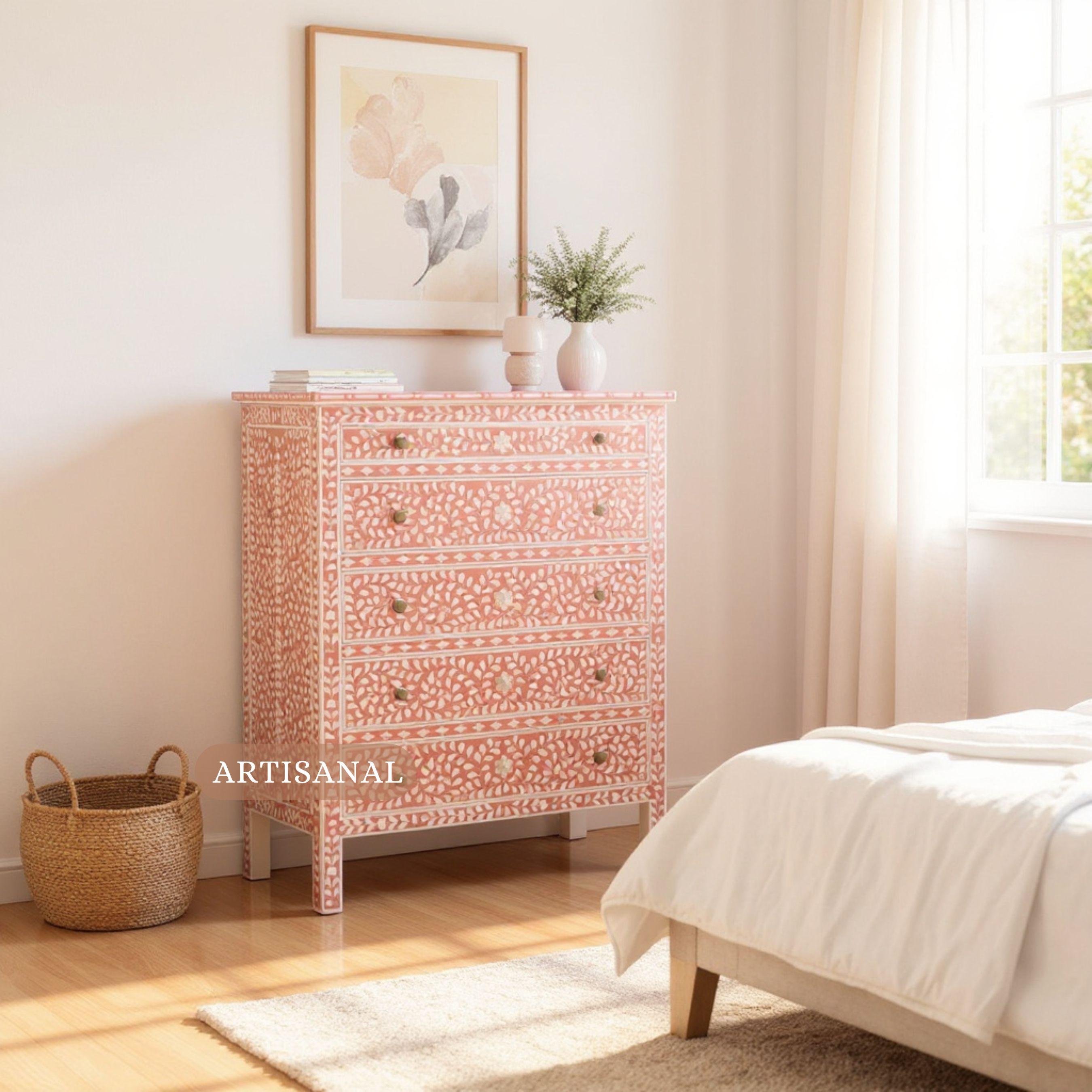 This exquisite tallboy dresser showcases the timeless beauty of handcrafted inlay artistry, designed to elevate interiors with its soft peach base and delicate floral motifs. Each drawer is meticulously inlaid with lustrous mother of pearl, forming