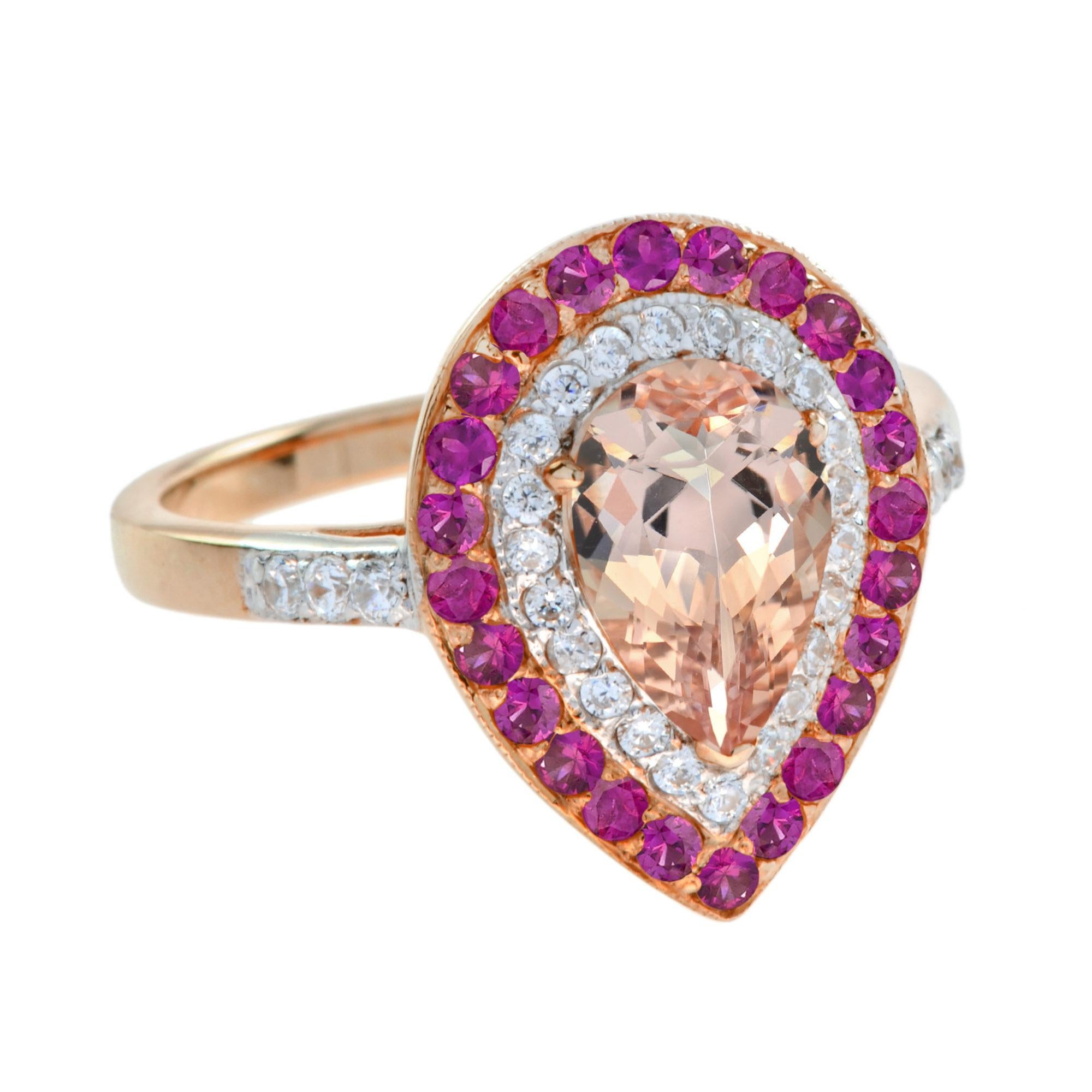 Offrez à votre bien-aimée cette brillante bague de fiançailles à halo qui présente une pierre centrale en morganite de couleur pêche taillée en poire avec un halo de diamants ronds et de rubis façonné en or. Cette magnifique bague est rehaussée
