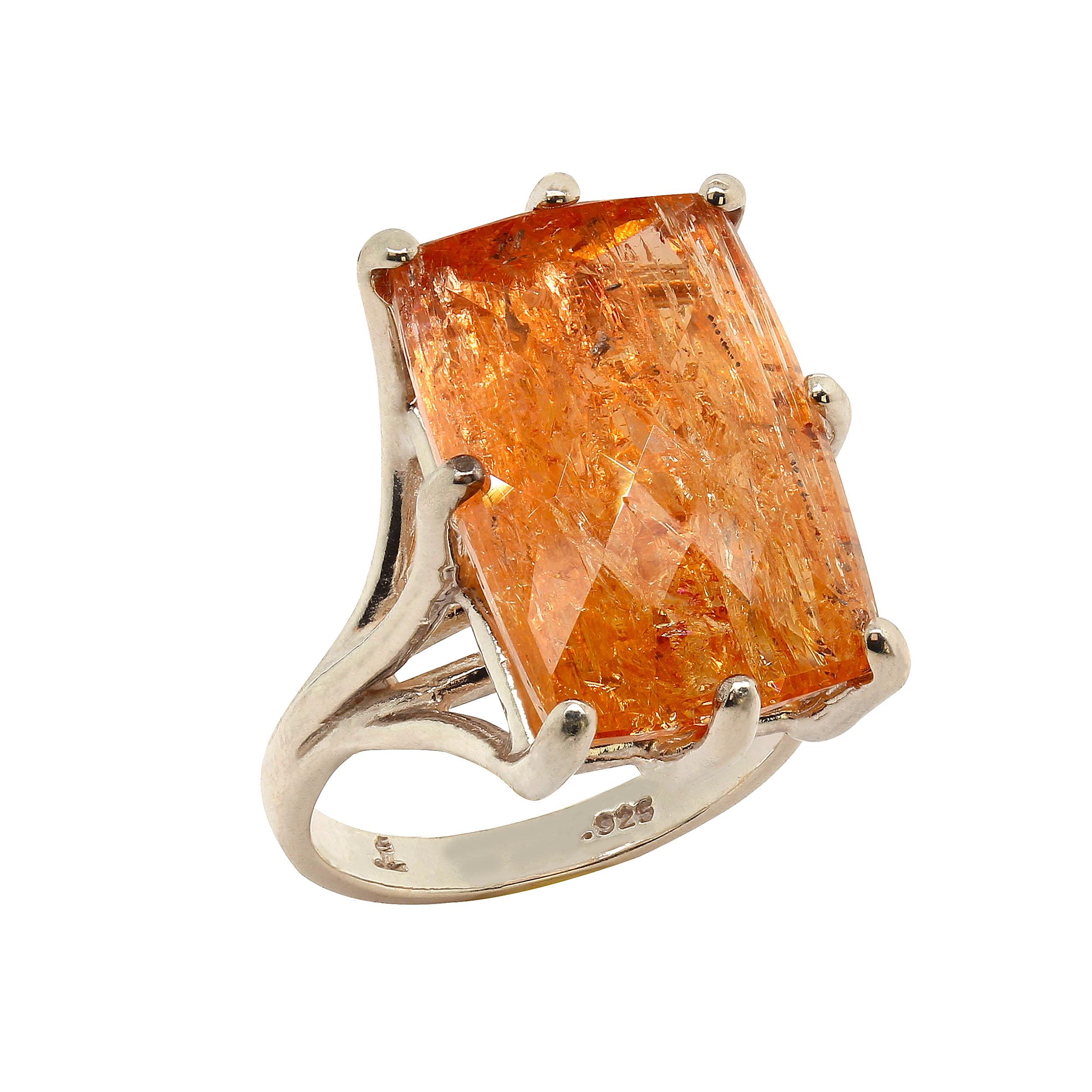 Sterling Silver Ring holding Rectangular Imperial Topaz with Checkerboard table.  This fabulous Imperial Topaz comes straight from Ouro Preto, Minas Gerais, Brasil.  It is a generous 19 X 13 MM, approximately 22 carats,  and sits fairly high off the