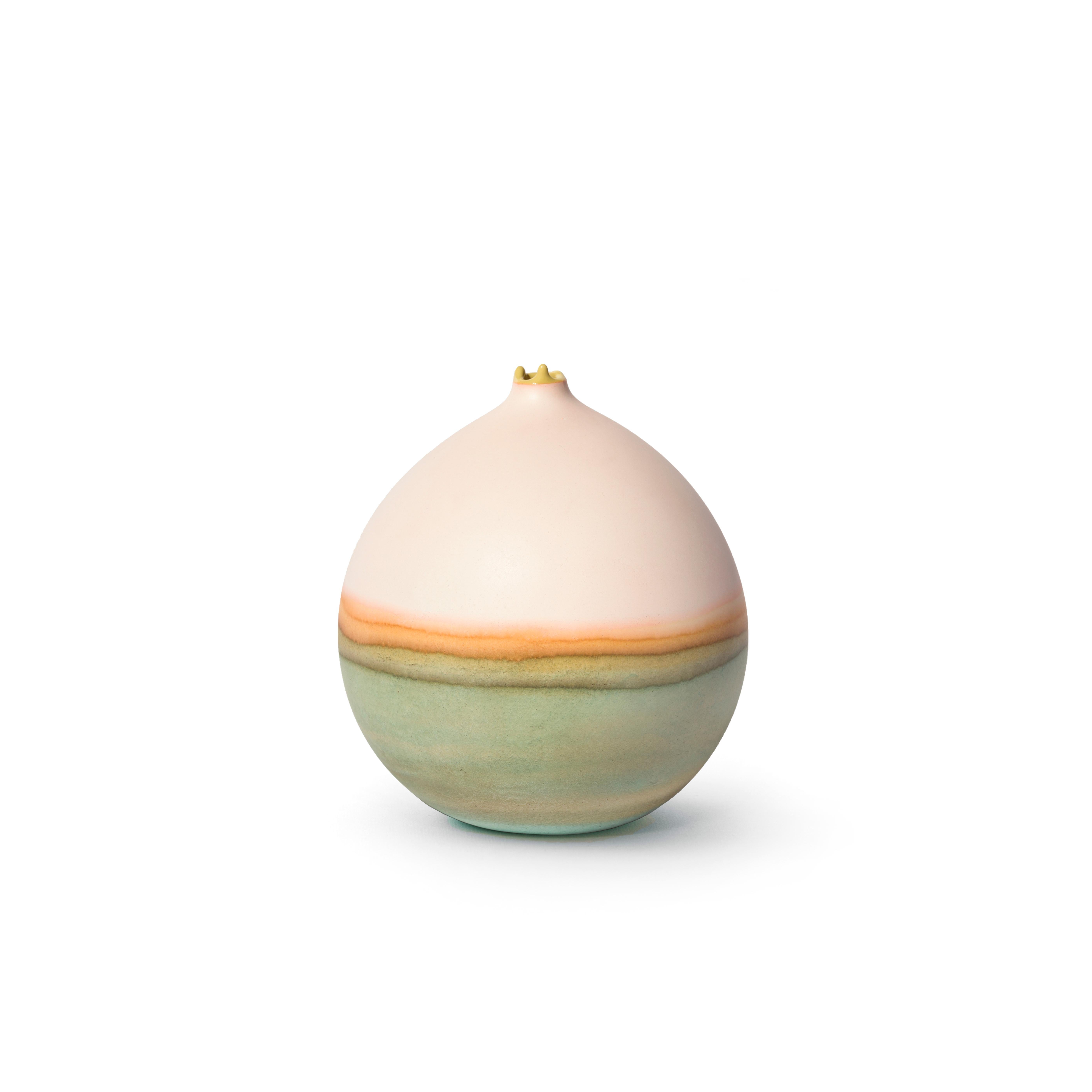 Peach Patina Pluto Vase by Elyse Graham
Dimensions: W 13 x D 13 x H 14 cm
Materials: Plaster, Resin
MOLDED, DYED, AND FINISHED BY HAND IN LA. CUSTOMIZATION
AVAILABLE.
ALL PIECES ARE MADE TO ORDER

This collection of vessels is inspired by striated