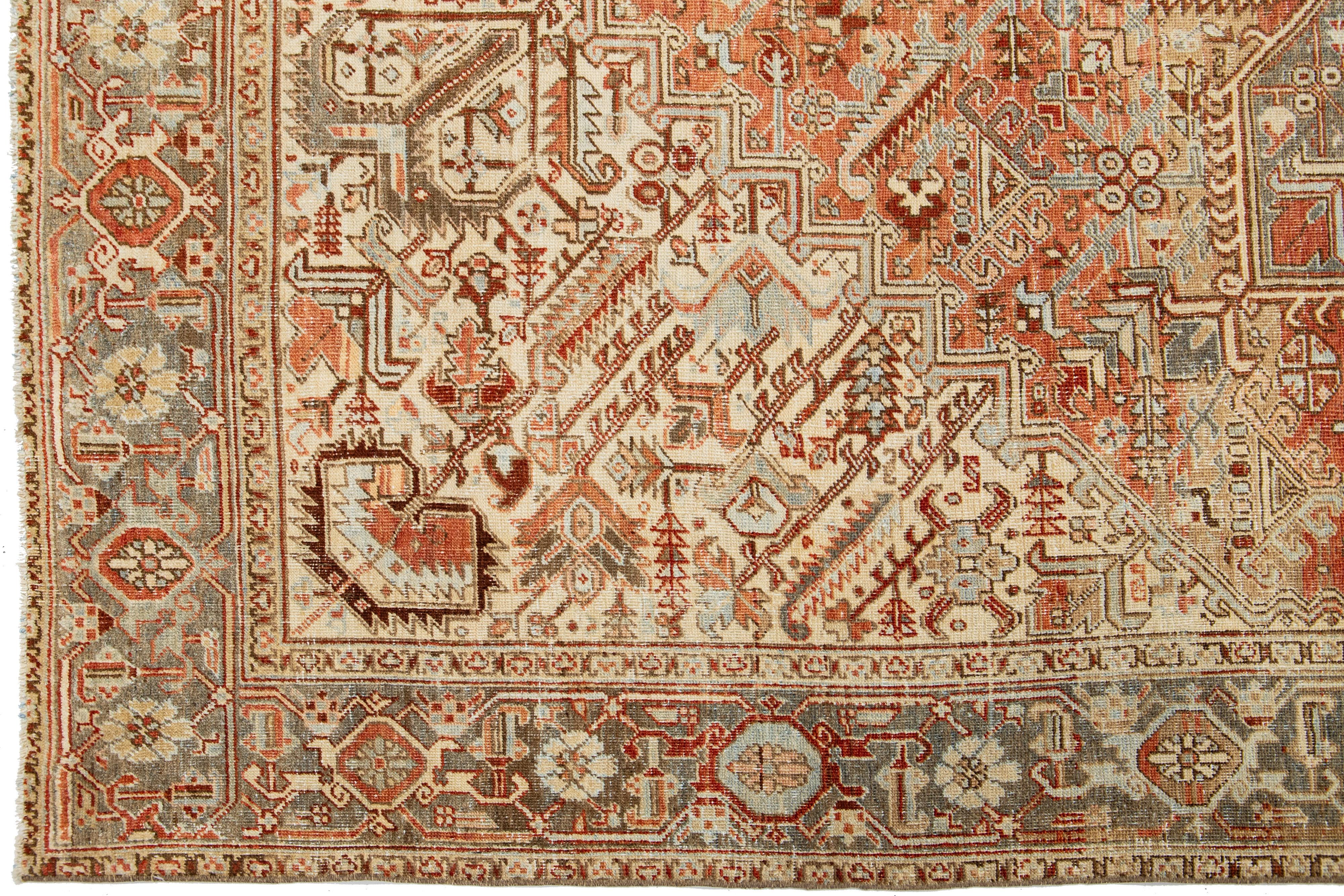 Hand-Knotted Peach Persian Heriz Antique Wool Rug Featuring a Medallion Motif From The 1920s For Sale
