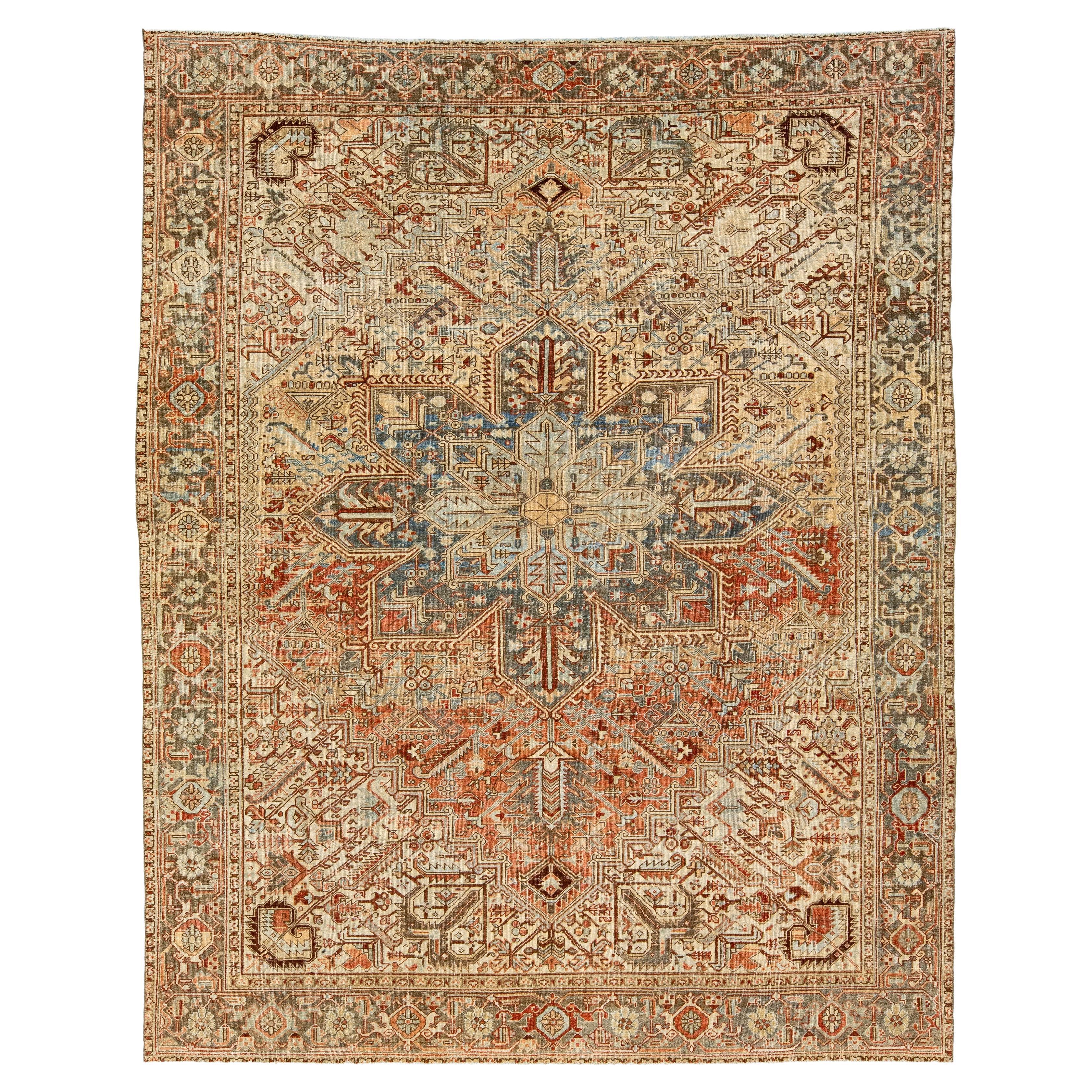Peach Persian Heriz Antique Wool Rug Featuring a Medallion Motif From The 1920s For Sale