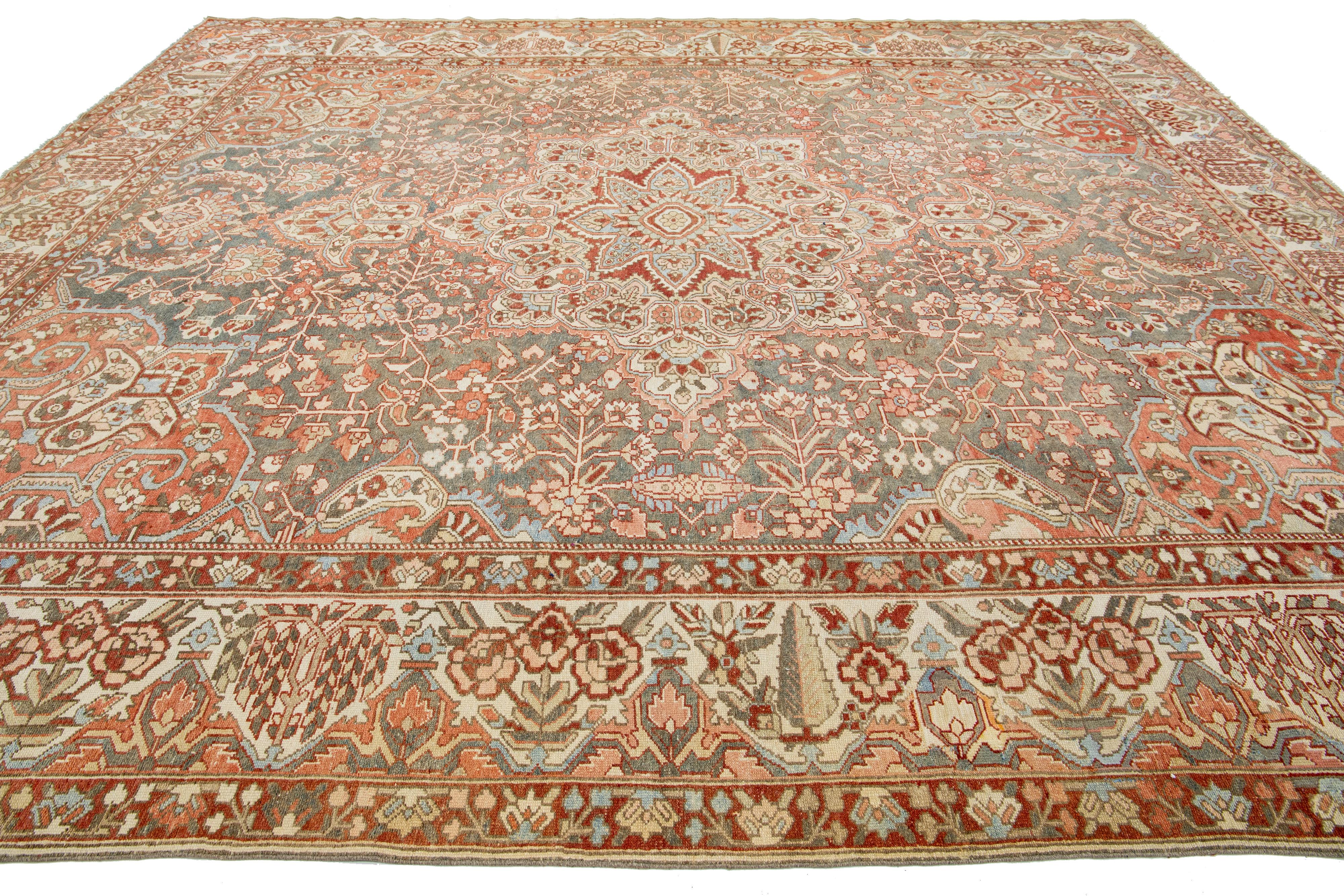 Hand-Knotted Peach Persian Medallion Bakhtiari Wool Rug was handcrafted in the 1920s For Sale