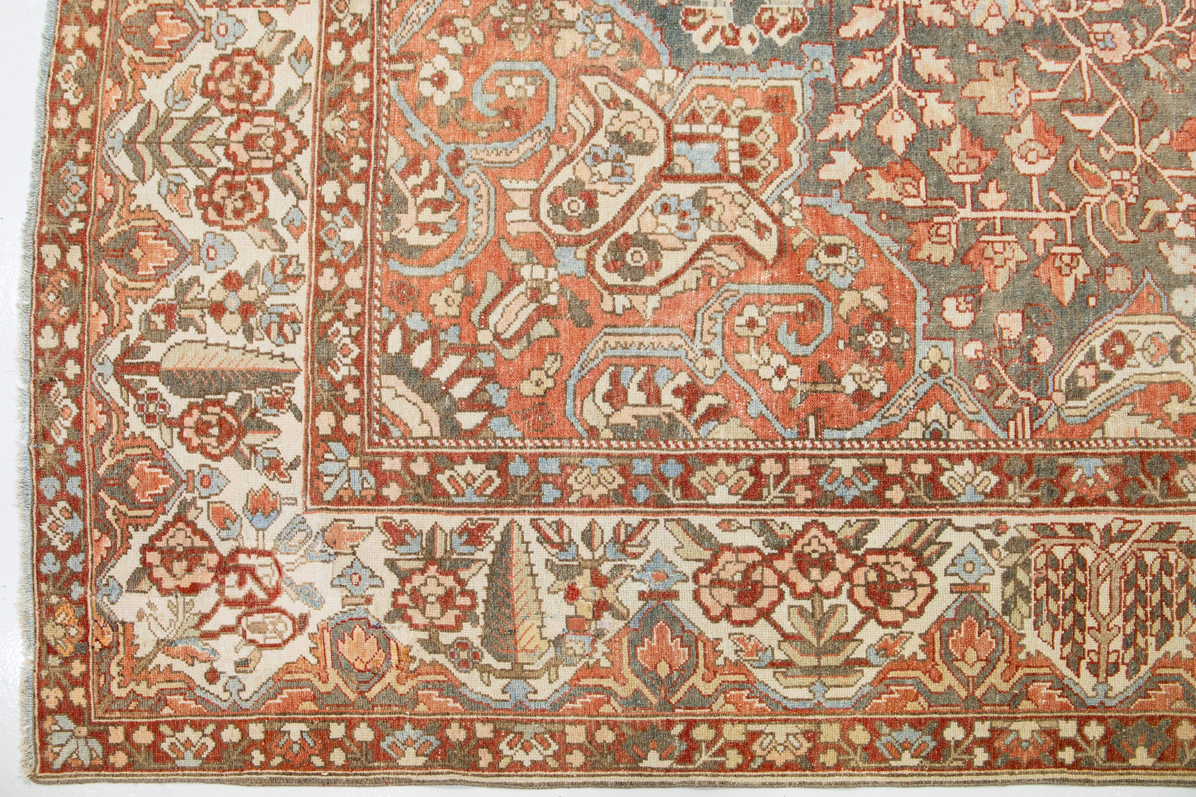 Peach Persian Medallion Bakhtiari Wool Rug was handcrafted in the 1920s In Good Condition For Sale In Norwalk, CT
