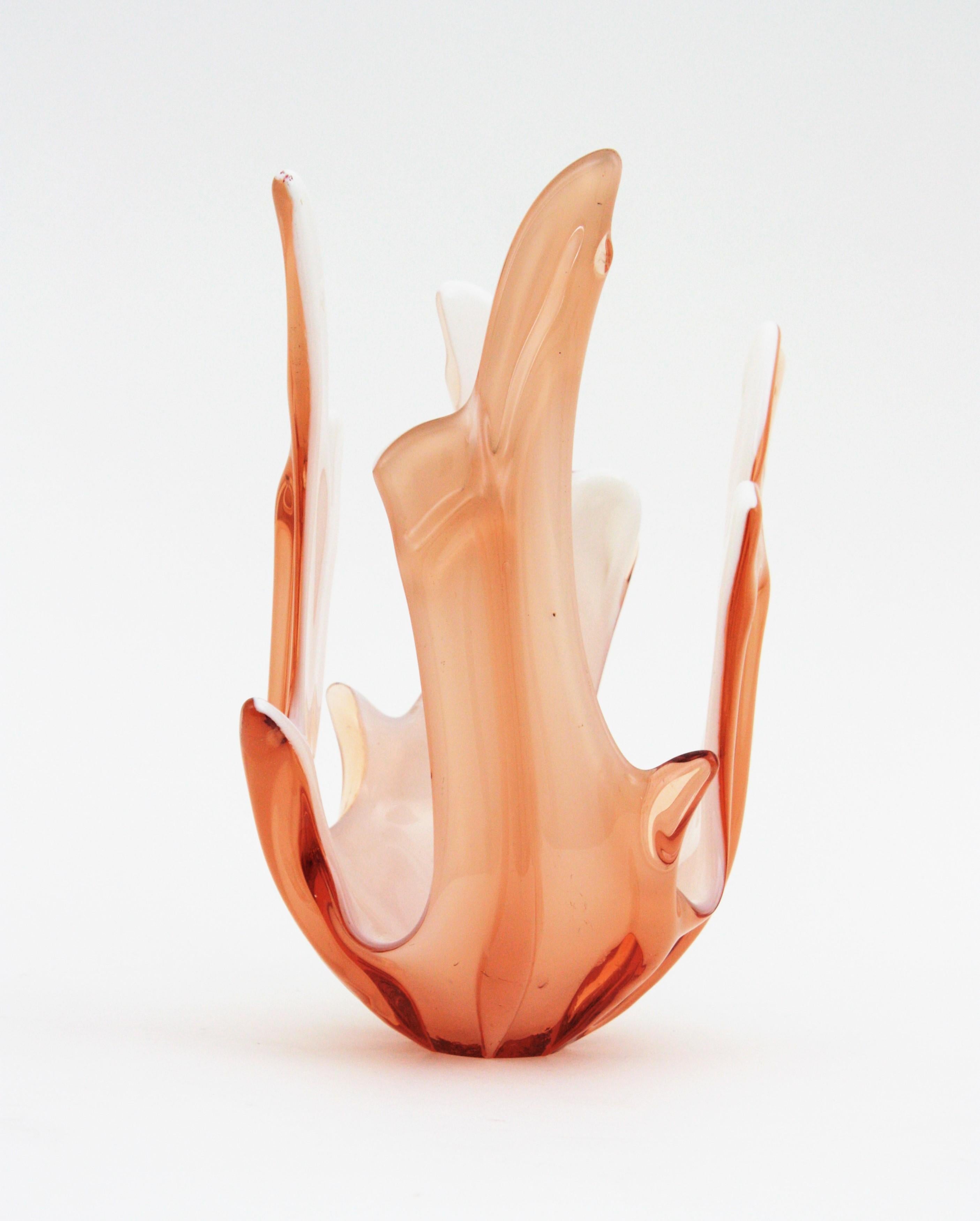 Sculptural Murano glass freeform centerpiece in peach pink color. 
The interior part is made in white opaline glass. The exterior part is made in baby pink / soft peach color.
Amazing organic design and eye-catching color.
Place it alone or as a