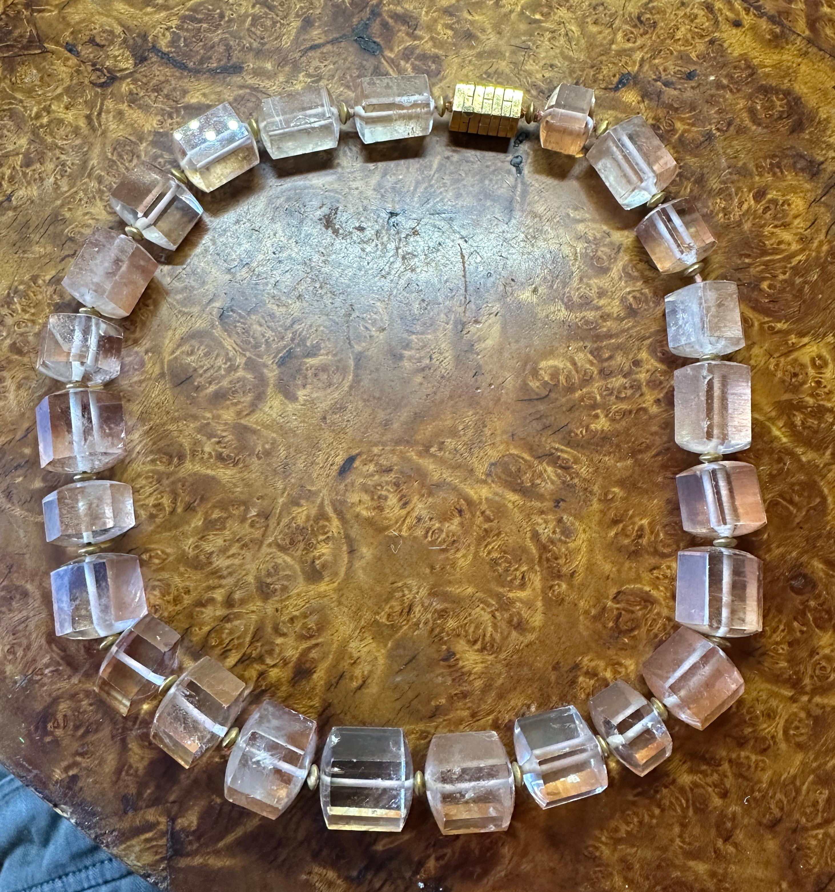 Indulge in a stunning monumental Peach Quartz Necklace in 14 Karat Yellow Gold.  The dramatic Necklace is 18.5 inches long and is set with gorgeous Peach Quartz gems which are cut in barrel shapes with six facets.   The individual beads are