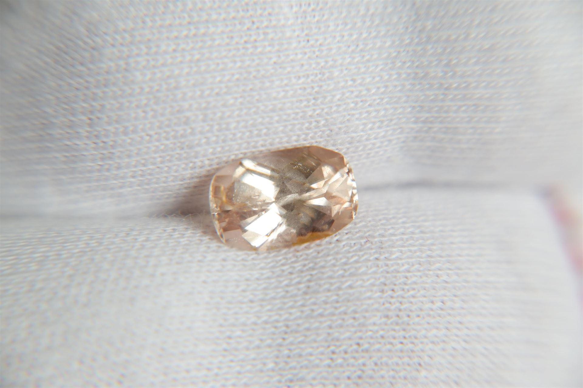 Peach Sapphire is a natural, unheated sapphire from Sri Lanka. This premium cut stone is a beautiful red-orange or orange-red color with excellent clarity and finish. It would make a beautiful ring or jewelry piece for anyone looking for a unique