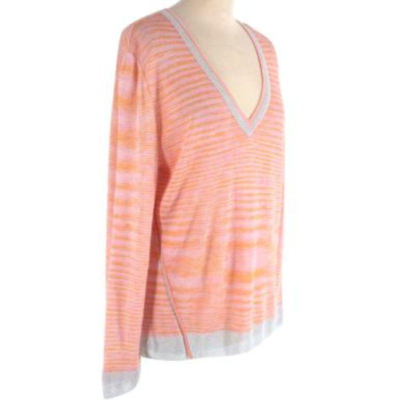 Missoni Peach Striped V-Jumper
 
 - Ribbed light pink and orange striped loose fitting jumper
 - Deep V style neckline 
 - Silver crochet trim on the cuffs, waistband, around the neck and up the hems at the side
 
 Materials
 54% Rayon
 23%