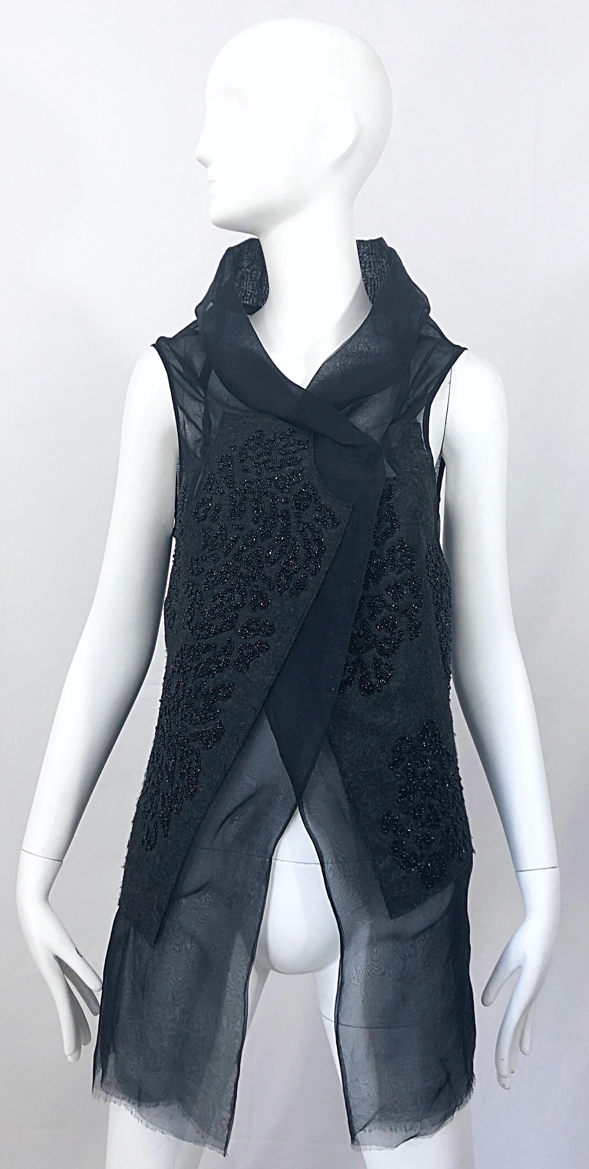 Rare PEACHOO + KREJBERG black silk and linen beaded hand made top / vest! Features thousands of hand-sewn black seed beads throughout the black wool trim. Hidden snaps up the asymmetrical bodice. Avant Garde layered cowl neck. Has a very Comme des