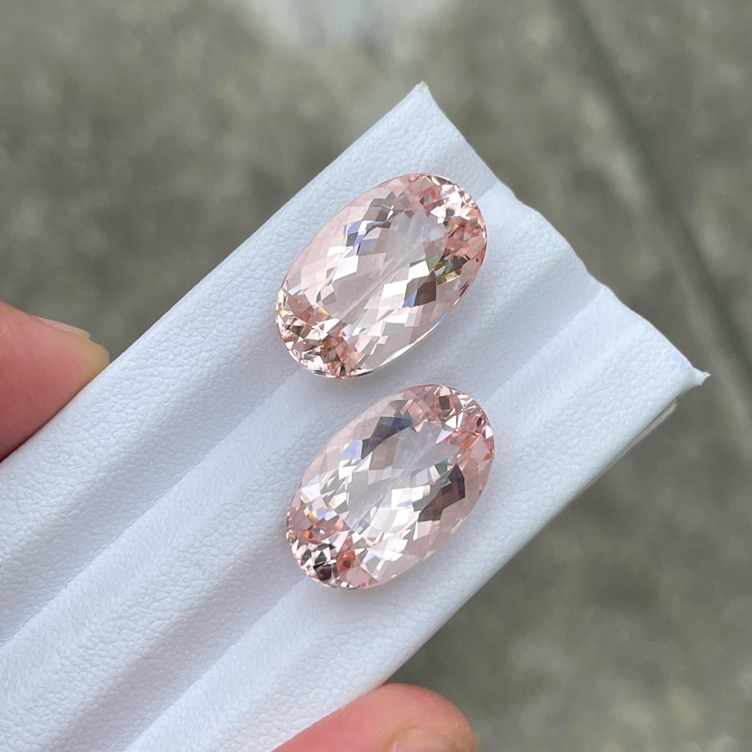 Peachy Pink Natural Morganite Gemstone Pair of 23.60 carats from Nigeria has a wonderful cut in a Oval shape, incredible Peachy Pink color. Great brilliance. This gem is  Loupe-clean.

Light Pink Natural Morganite Stone For Ring