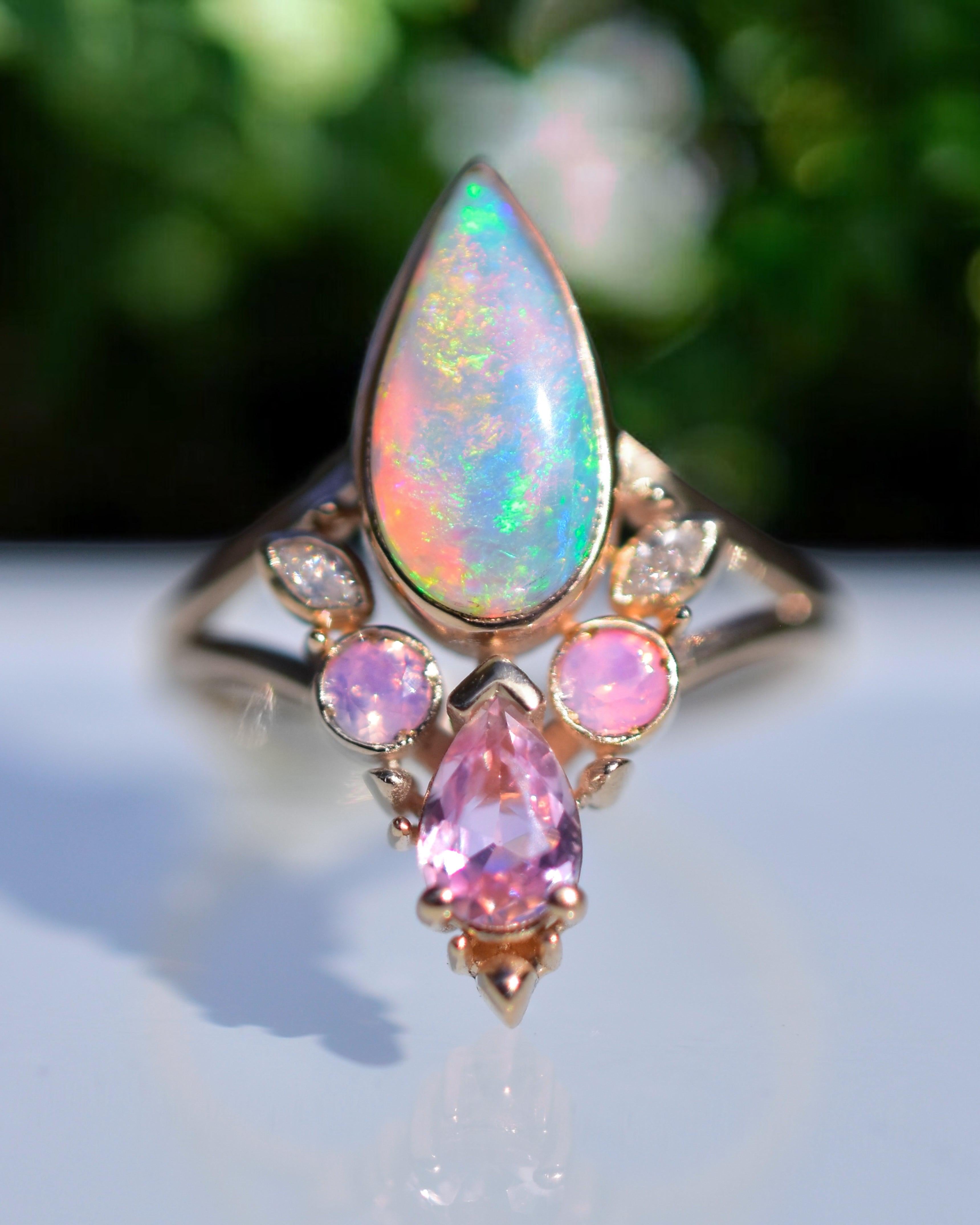 Peachy pink Rainbow Opal Ring, Opalescent Sapphires, Natural Diamond, 14k Yellow Gold. 23mm in length.

This new Rainbow Sherbet Ring with Opal, opalescent sapphire, sapphire and diamonds in rose gold is good enough to eat!  I love the orange and