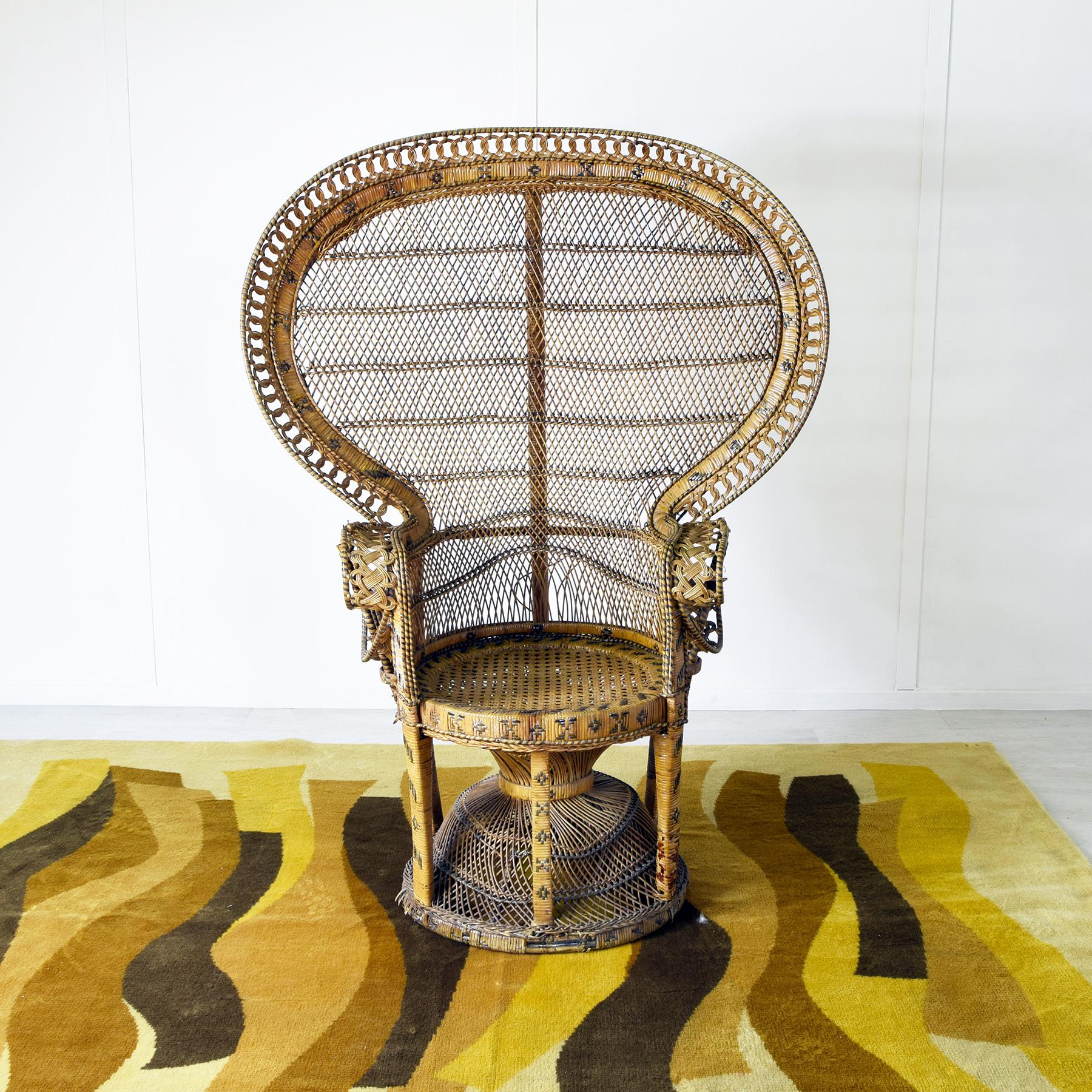 Peacock chair or Emanuelle chair, starring in the French film Emmanuelle, 1974. Based on the novel by Emmanuelle Arsan. Rattan and wicker chair with a high, wide back adorned with a traditional crest.

When you purchase vintage design products on