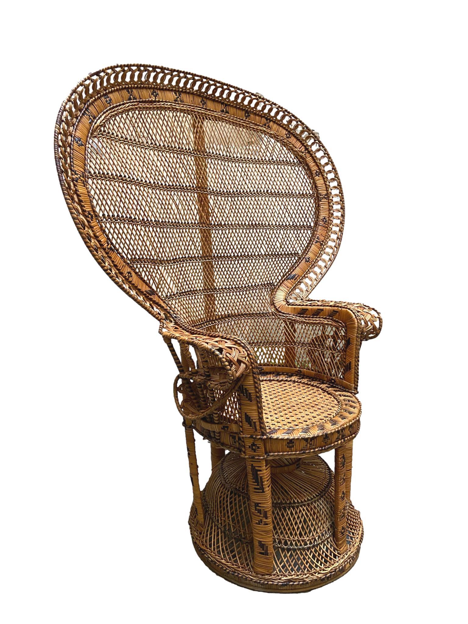 Iconic Emmanuelle Peacock wicker armchair. Manufactured by the famous French company Kok Maison, and advertised in a 1970s film of the same name, Emmanuelle.