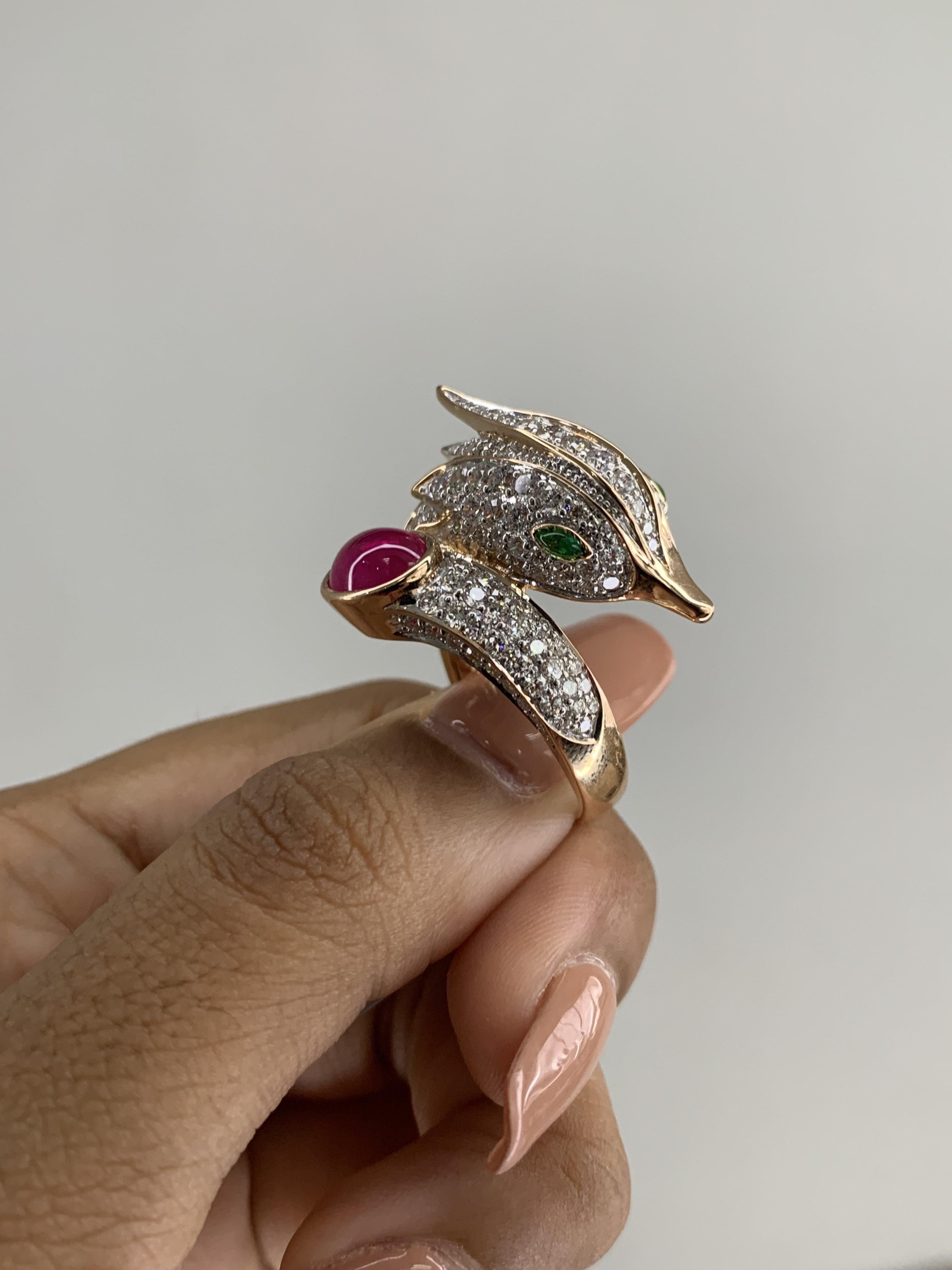 Chances are, you've never encountered a piece of jewelry quite like this one! This exceptional ring draws inspiration from the golden and sacred peacock bird, featuring a striking peacock head design that exudes grandeur and captivates the senses.