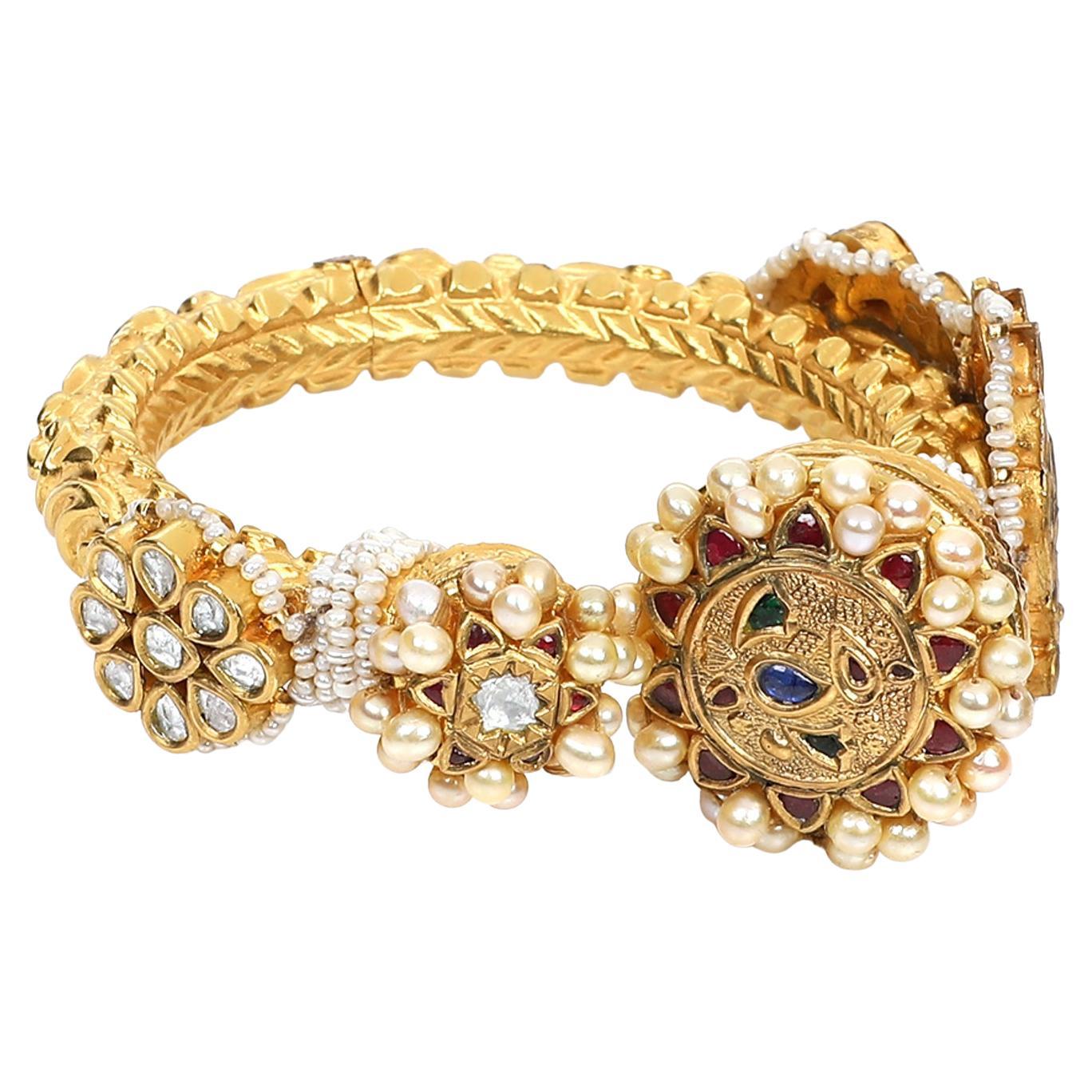 Peacock jadau gold bangle by Vintage intention
