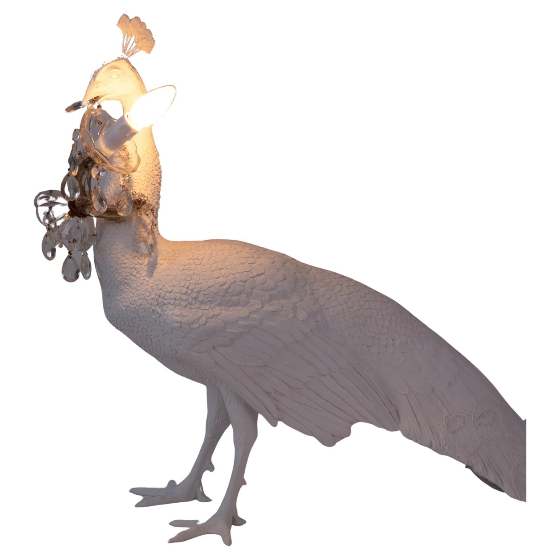 The Peacock Lamp is another amazing sculpture by Marcantonio that gives any space an edge with a bit of life. It decorates your interior with fun and adds character to a space in the form of one of the world's most exotic birds.