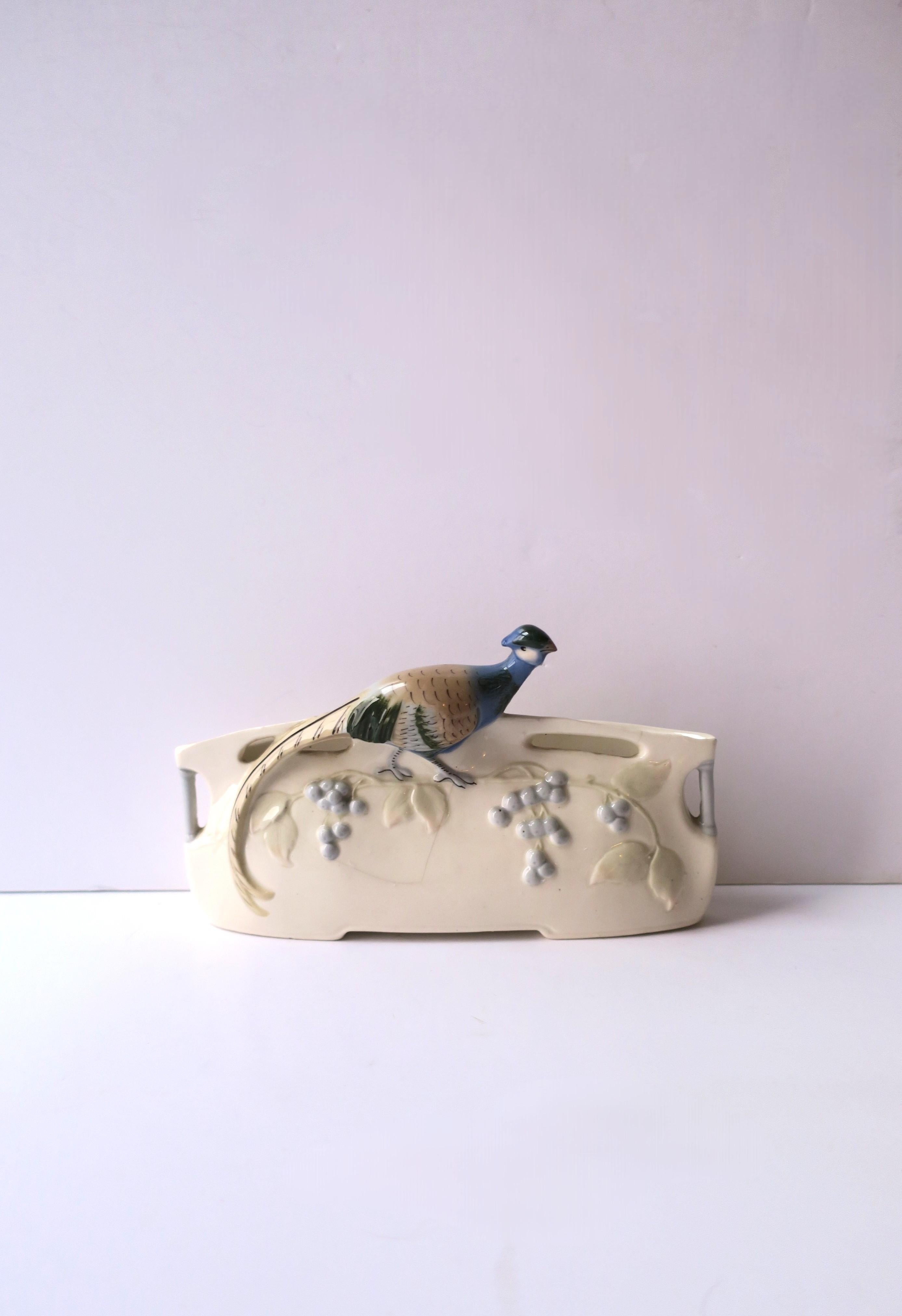 A desk letter or mail holder with a peacock or pheasant bird design, in the Art Nouveau design style, circa early to mid-20th century. A desk letter mail holder with beautiful bird design. Dimensions: 2.25