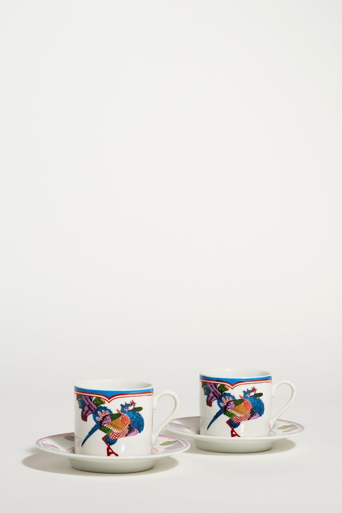 Porcelain tea set with ornate peacock design by the mid-century glassware and ceramics designer Georges Briard.