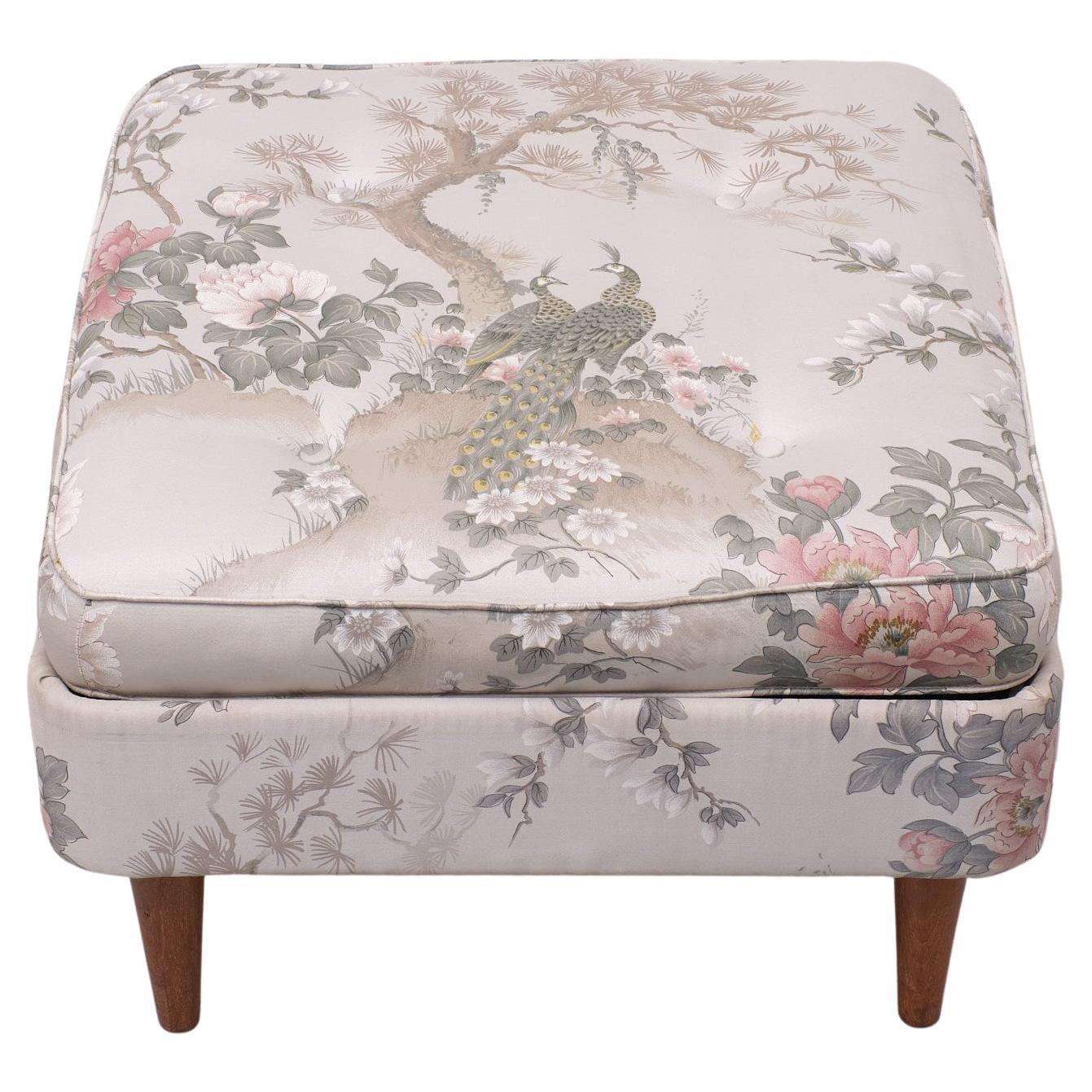 Very nice Pouf .Silk upholstery . Two Peacocks .in a land scape .  Hollywood Regency style .Solid Teak feet . So stylish.  

Please don't hesitate to reach out for alternative shipping quote