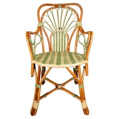 Peacock Rattan Arm Chair by Creel and Gow