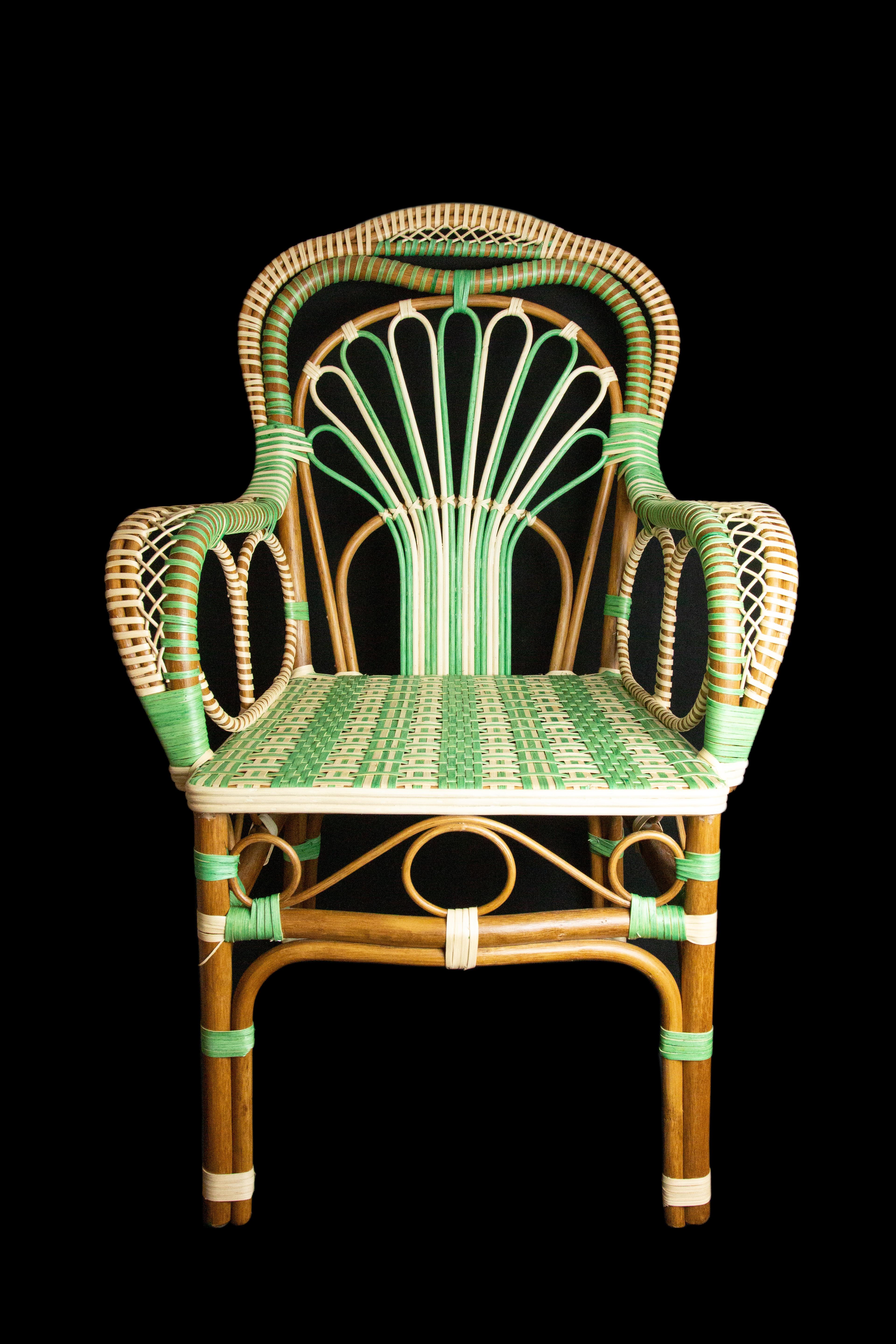 Peacock Rattan Arm Chair. Made exclusively for Creel and Gow in Tangier Morocco.

Measures: 18