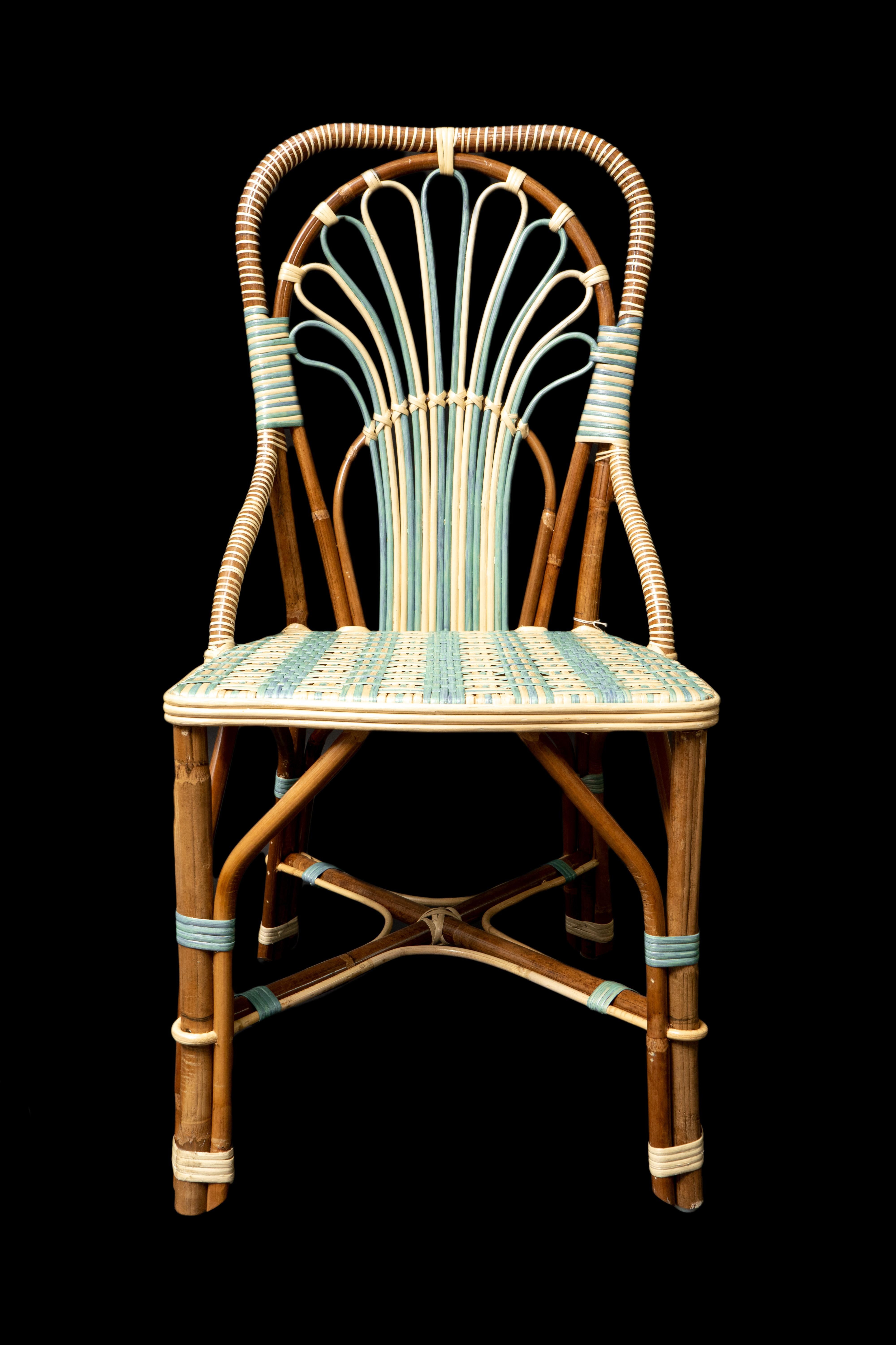 Peacock rattan arm chair. Made exclusively for Creel and Gow in Tangier Morocco.

Measures: 18