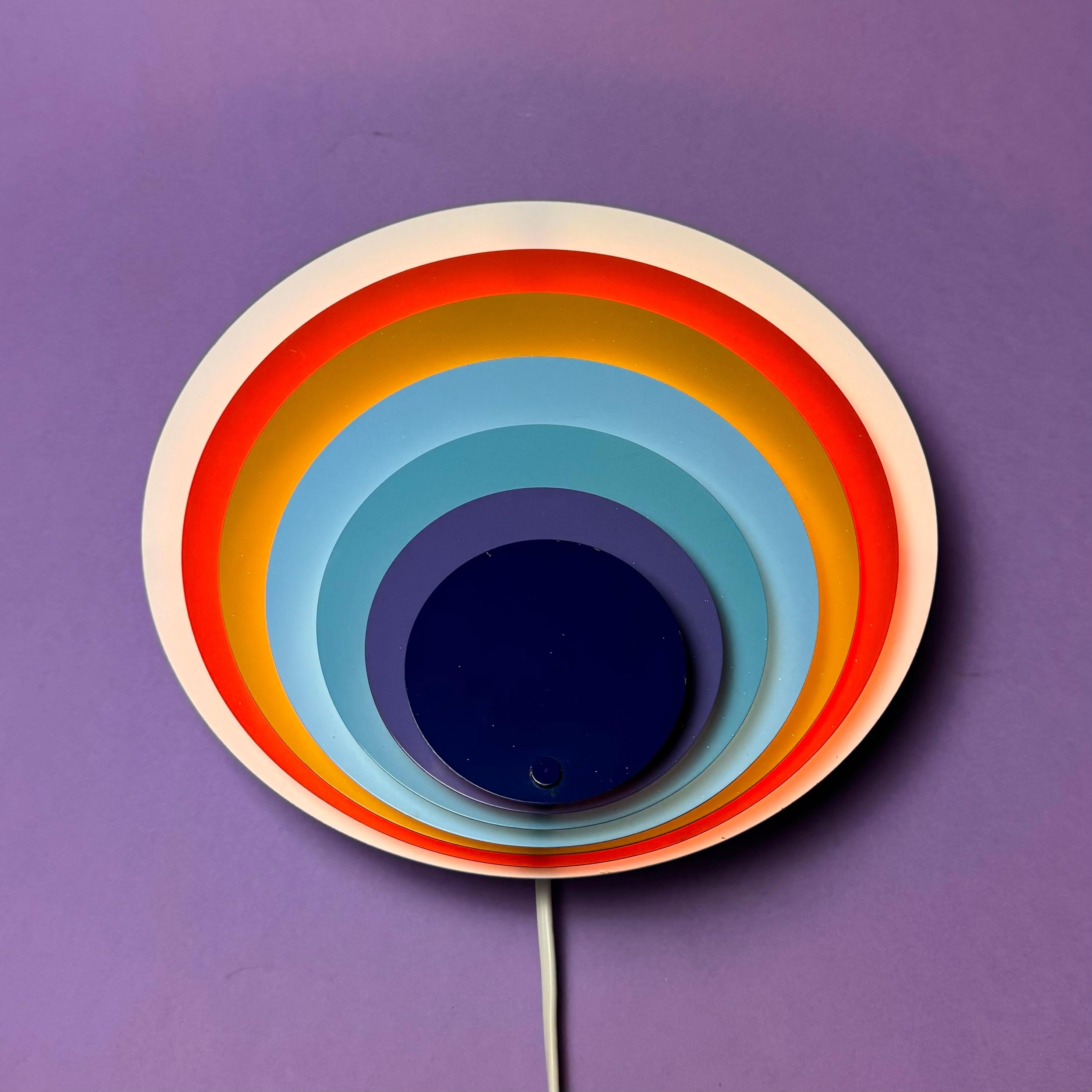 One of the most iconic danish designed wall lights from the modern era. 

The multicolored Peacock wall sconce was designed by Bent Karlby for LYFA in Denmark 1970s.

Peacock is a highly sought after design piece and very rare. 

Excellent original