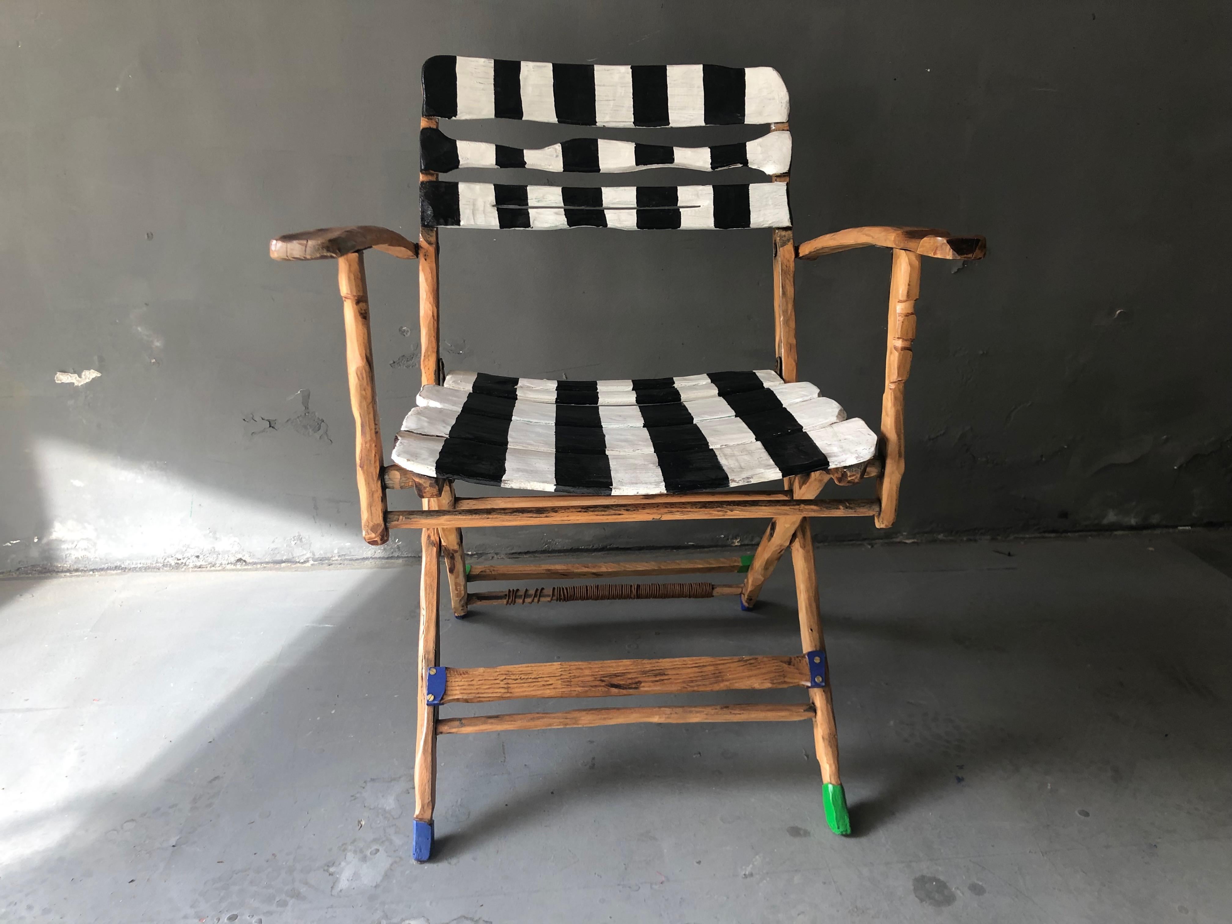Peak Of A Century Chair by Markus Friedrich Staab
One of a Kind
Dimensions: D 42 x W 66 x H 82 cm.
Materials: Wood, lacquer, paint.

50’s Garden Chair foldable, re-shaped, painted, and multi-lacquered.

Markus Friedrich Staab
Furniture has always