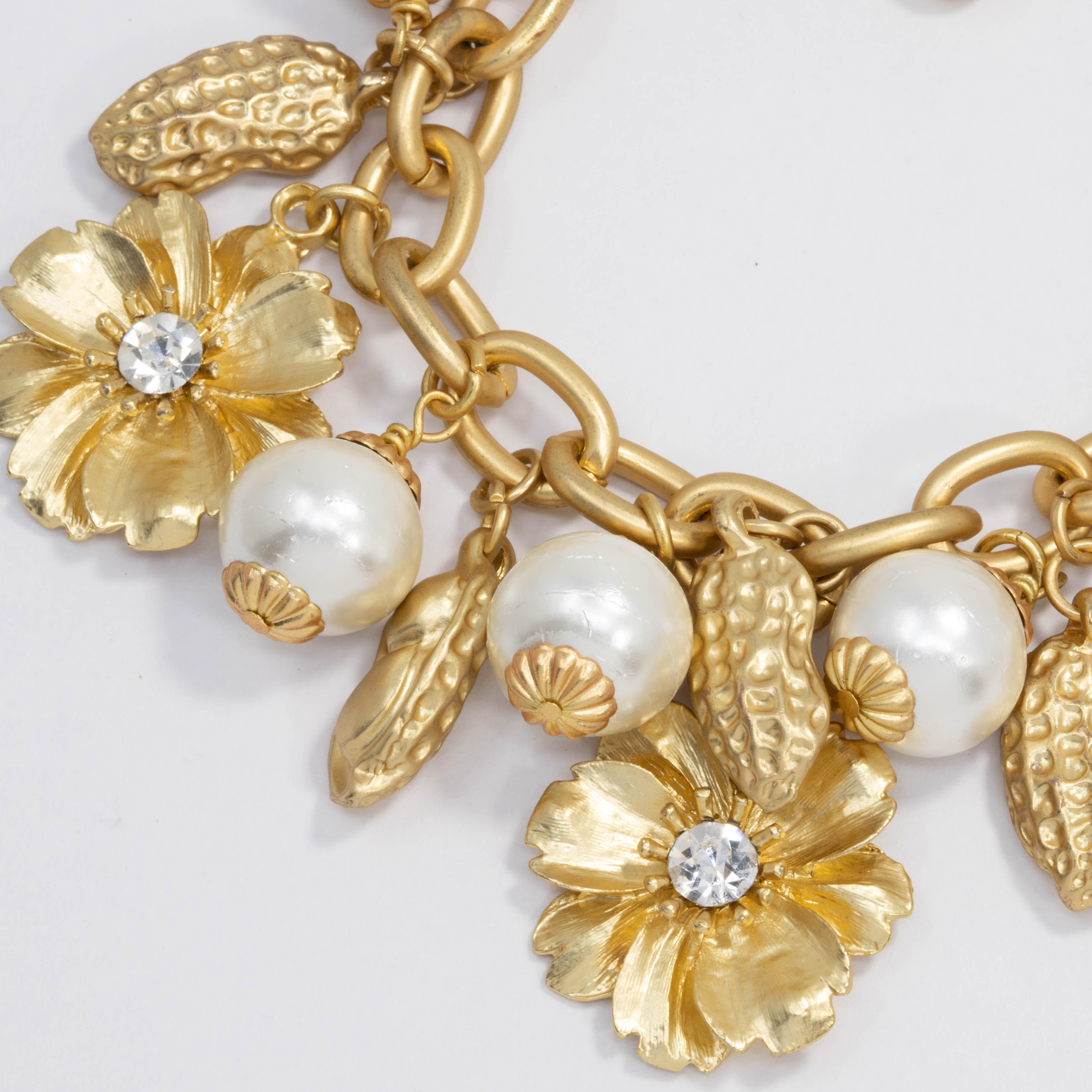 Peanut, Flower, and Faux Pearl Charm Chain Bracelet in Gold, Mid to Late 1900s In Excellent Condition In Milford, DE