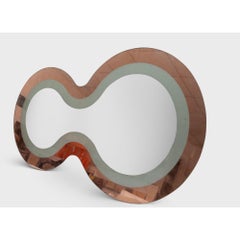 "Peanut" mirror, eglomized copper leaf and white gold leaf
