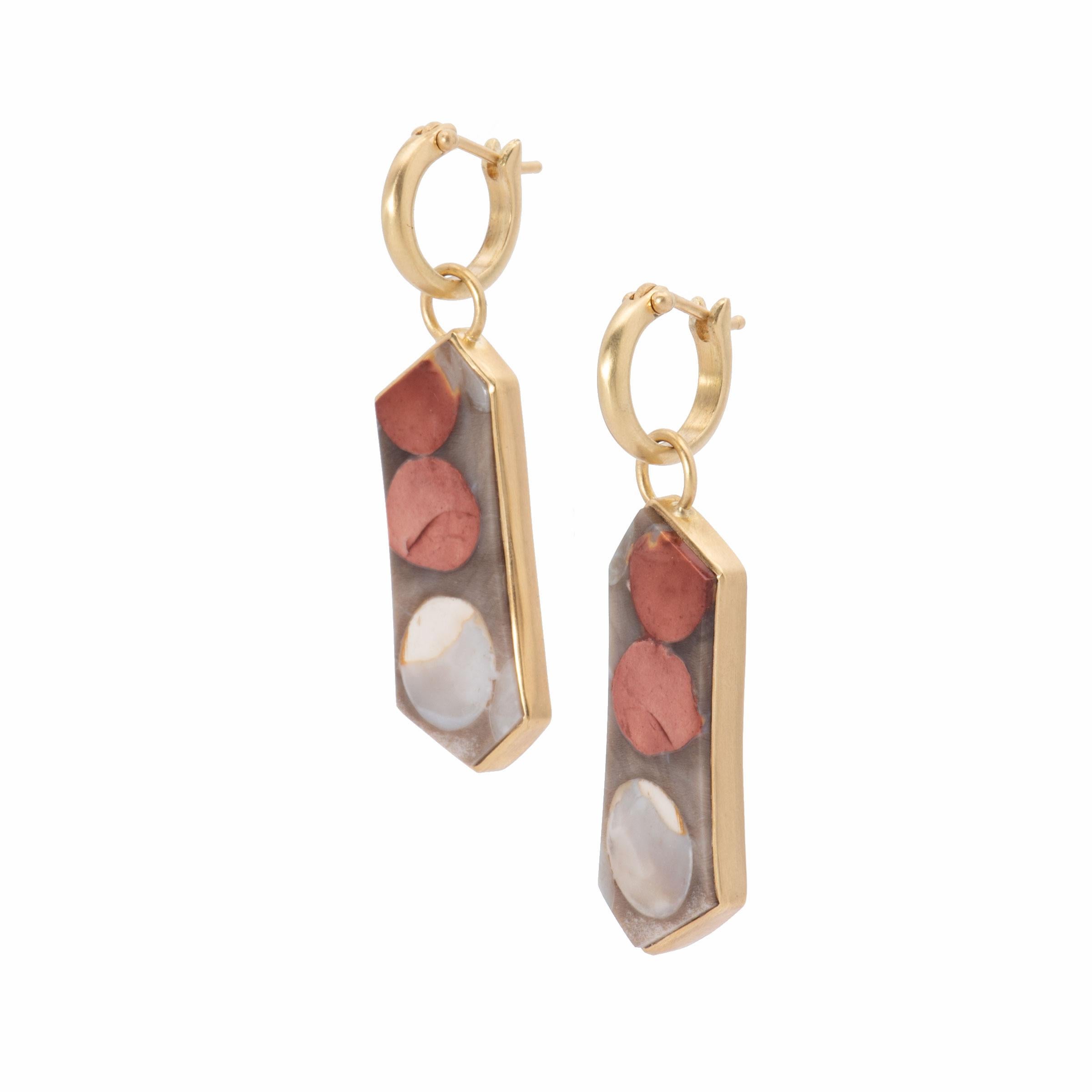 Peanut Wood Drop Earrings 18k gold have nothing to do with peanuts! Peanut wood is a fossil gem created by Australian conifer trees washed into the sea millions of years ago. Sea worms bored into the soft wood for food, and the round and oval