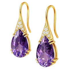 Boucles d
oreilles poire améthyste en argent et or